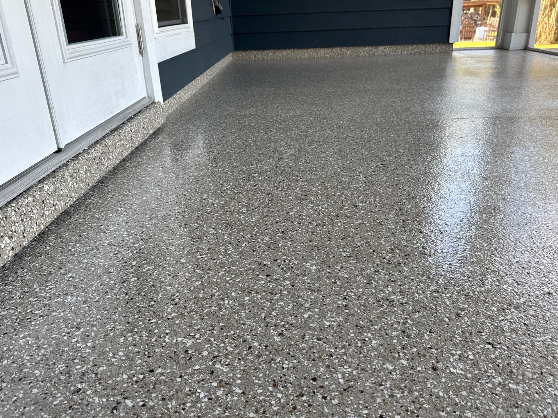 Front and Back Porches in Chiefland, FL in Pebble Beach by Cross Creek Concrete Coatings