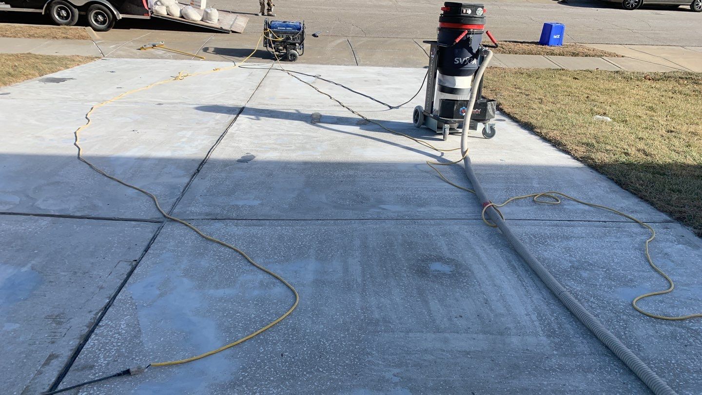 Driveway using Slate Stone by Select Painting, Coatings & Garage Cabinets