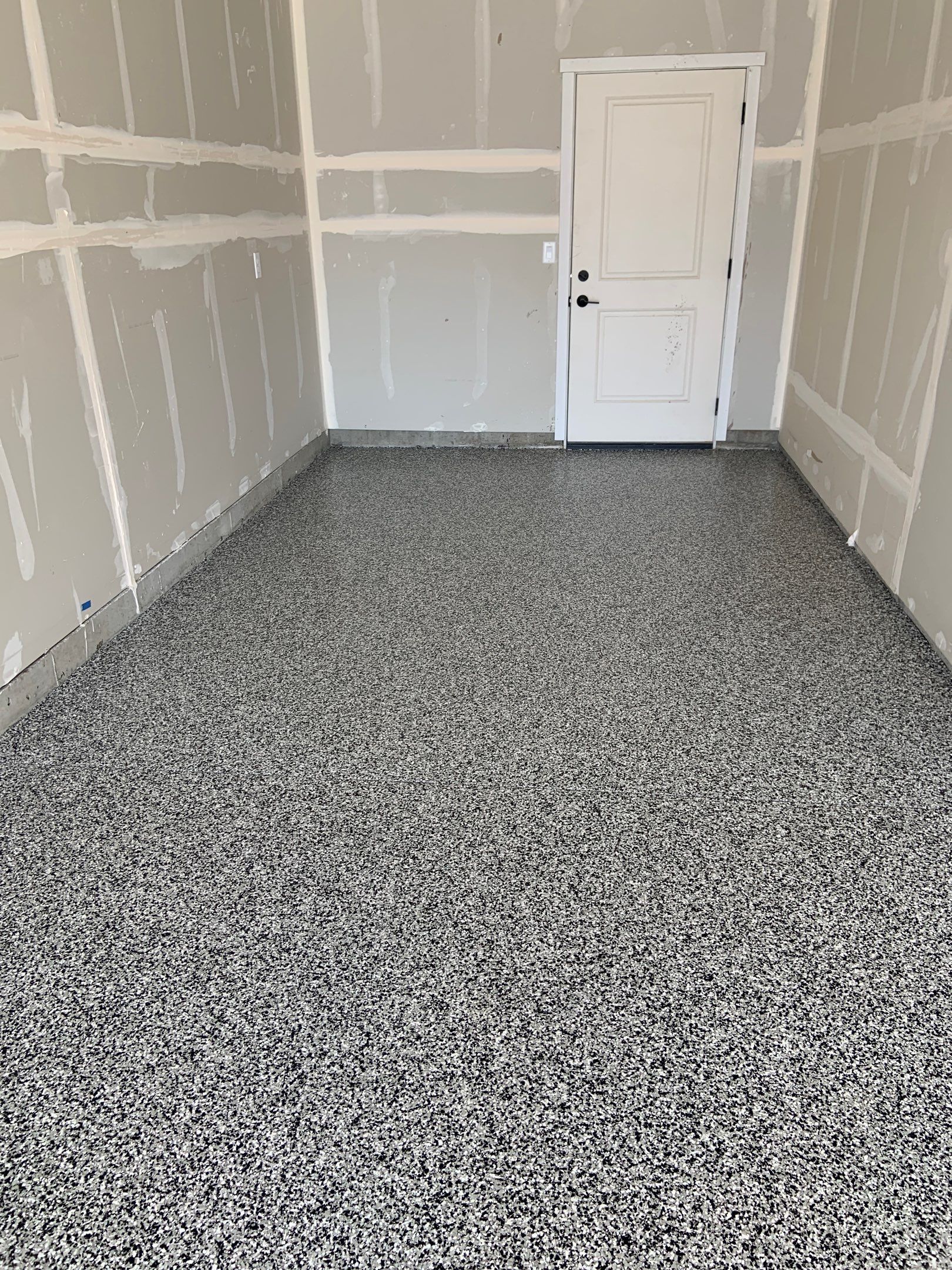 Garage Transformation using Domino by Croc Coatings, LLC
