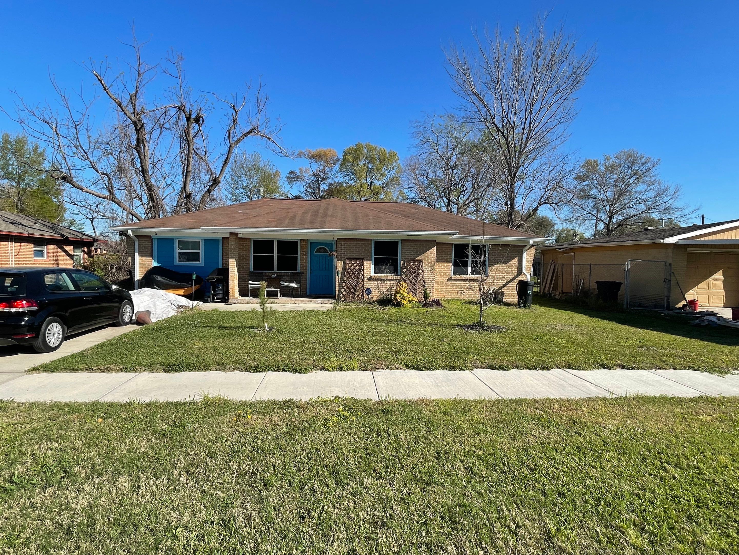 Houston Residential Roof Replacement Using Harbor Blue Architectural Shingles by Houston Roofing & Construction
