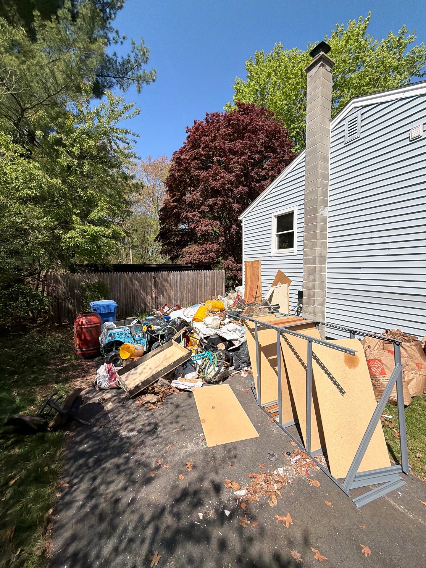 Full Property Cleanout at a Split-Level Home in Montville, CT by Diamond Image LLC