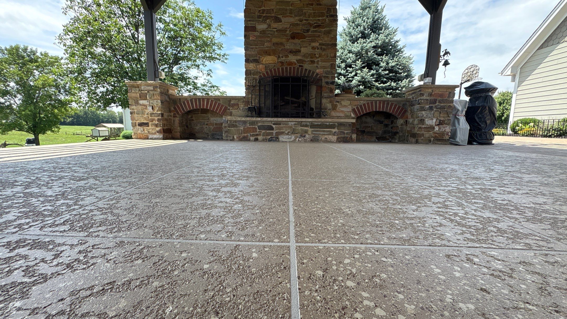 Custom Back Patio Resurface - Kearney, MO by Big Red Decorative Concrete, LLC