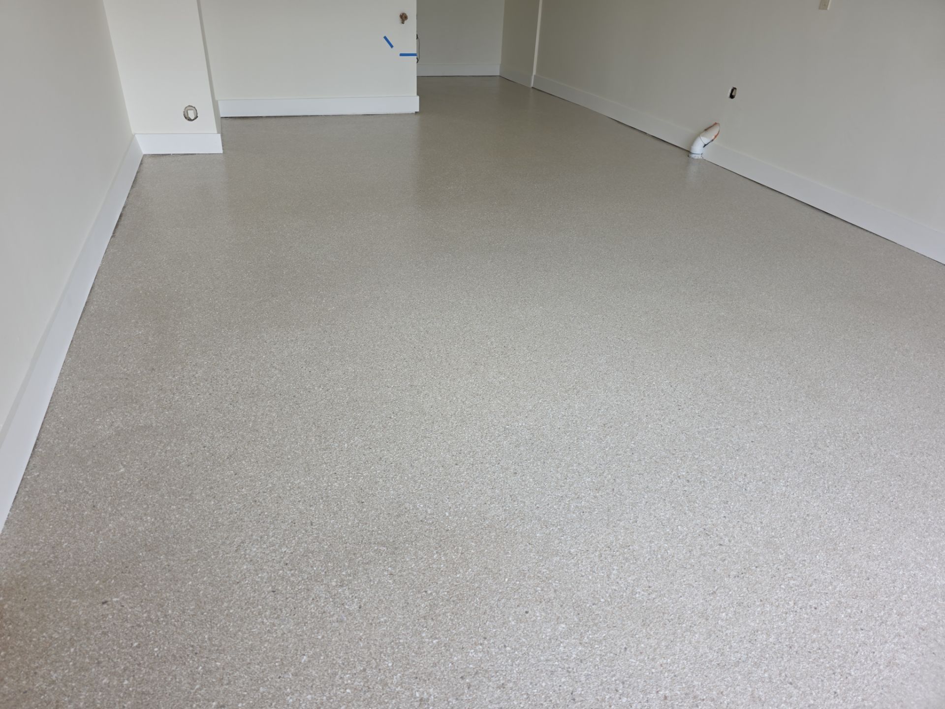Garage Transformation using Sandstone by Croc Coatings, LLC