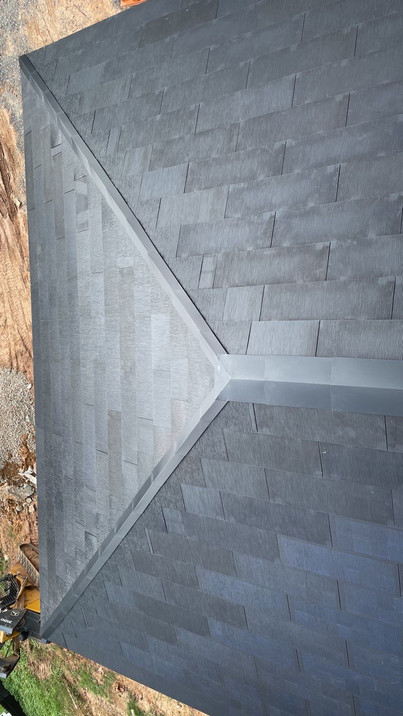 Tesla Solar Roof  using Tesla Solar Roof V3 tiles by American Home Contractors