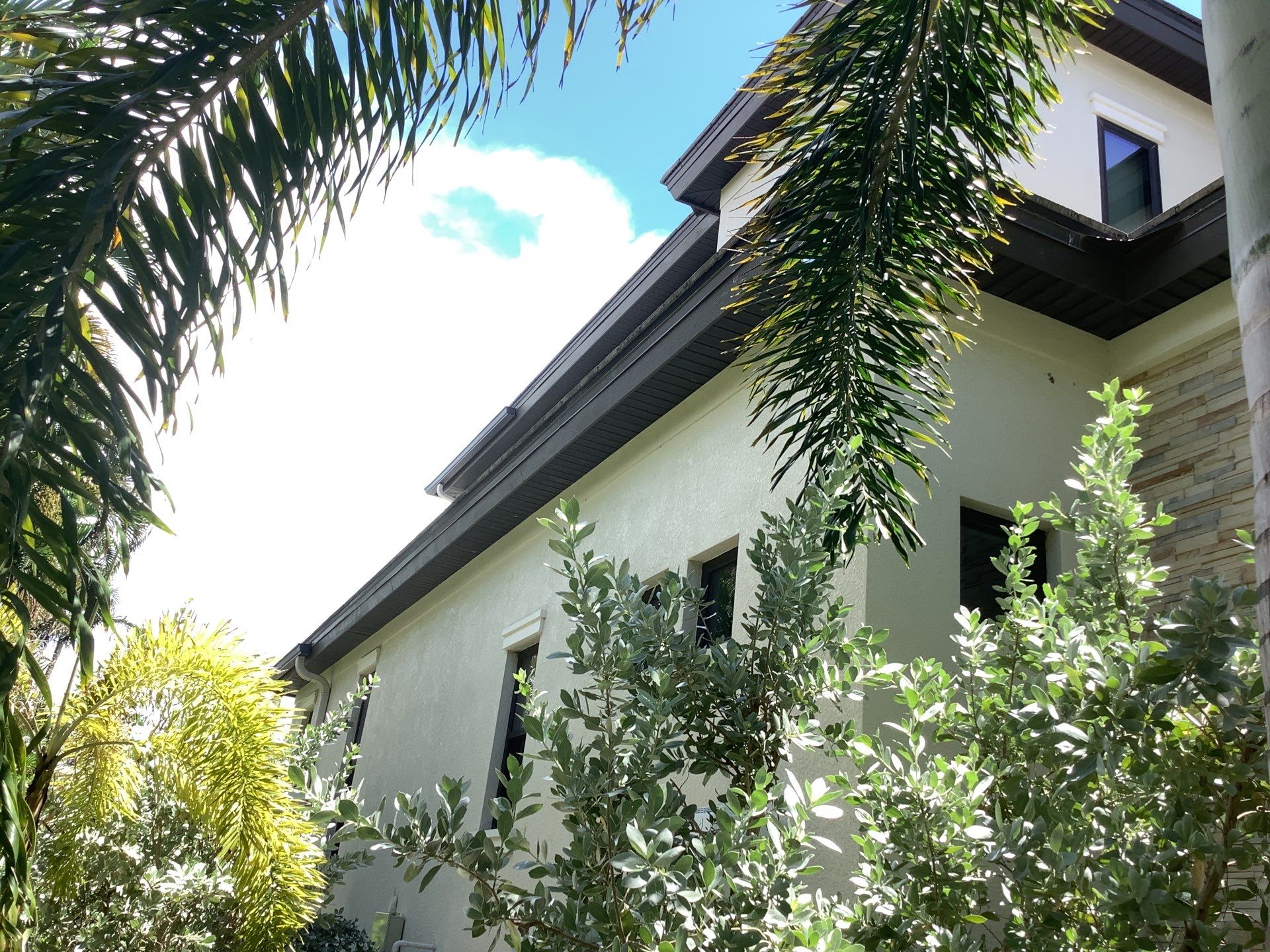 Bronze Gutters and Almond Downspouts in Longboat Key FL by Gutter Professors