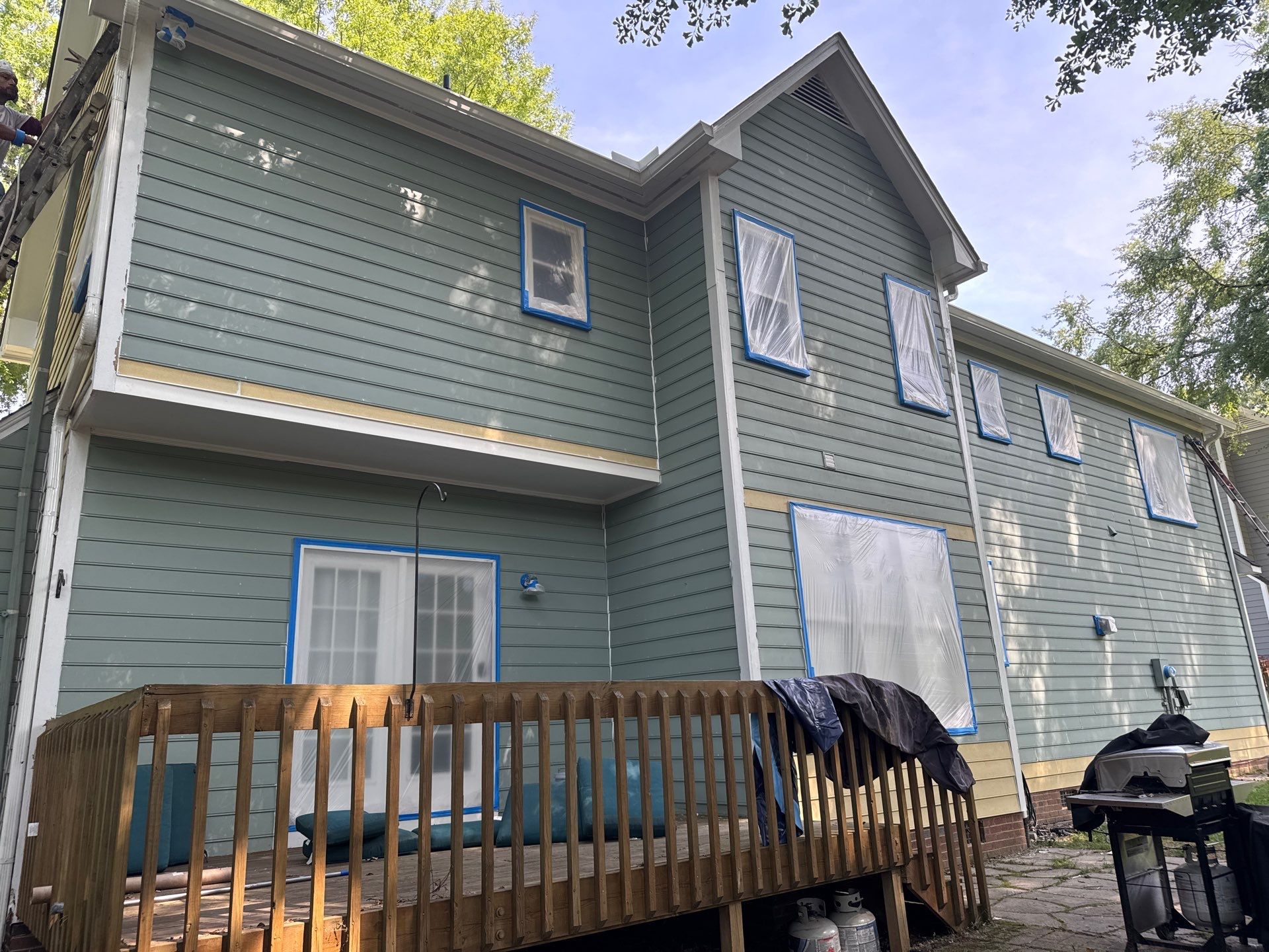 Siding Replacement and painting by GonzalezPainters & Contractors Inc 