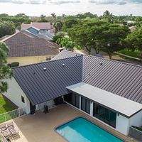 24ga 1.5" Mechanical Seam Dark Bronze by Total Roofing System The Metal Roof Experts