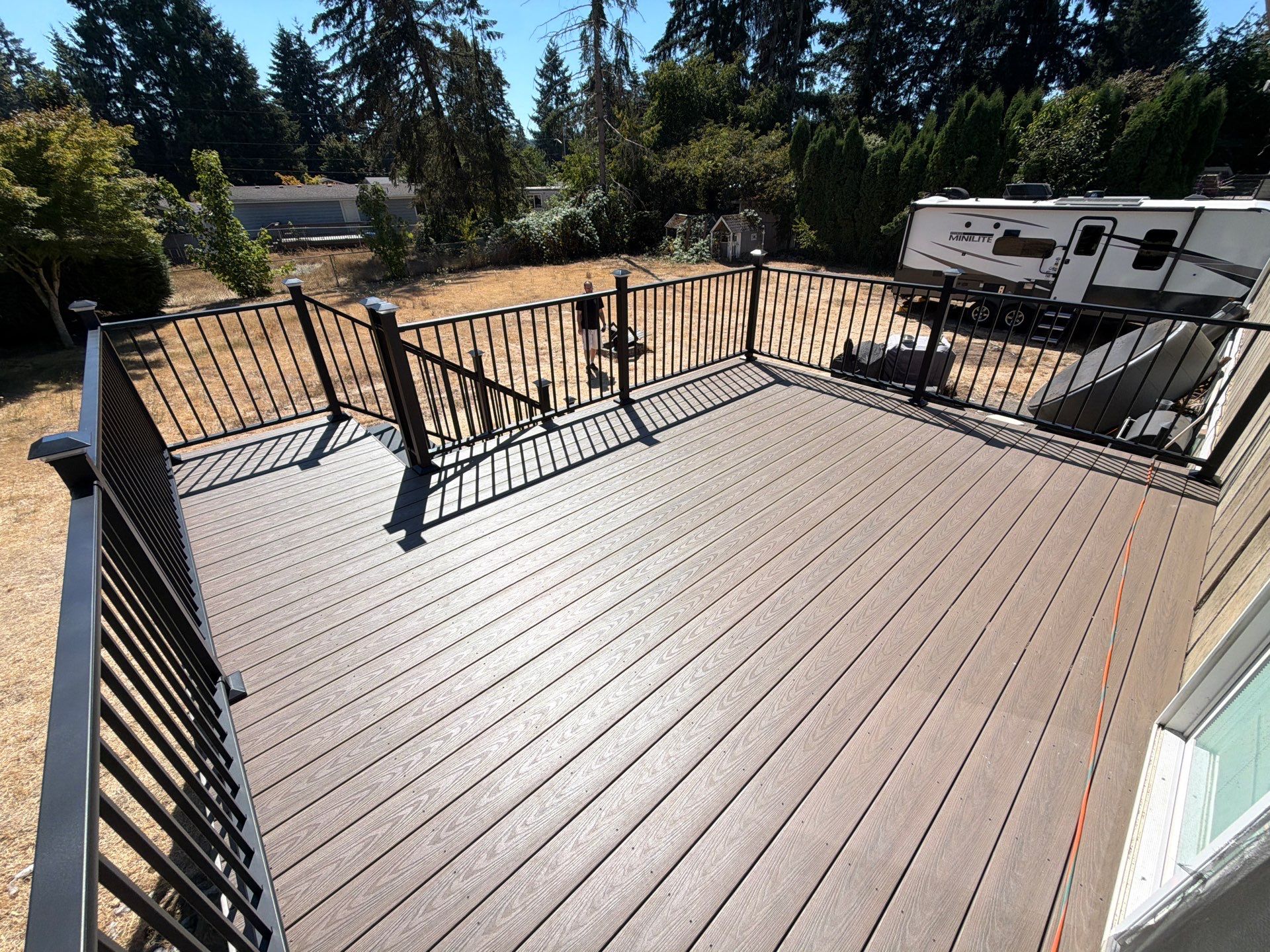 Composite Deck Installation with Black Metal Railings in Bonney Lake by Expedeck