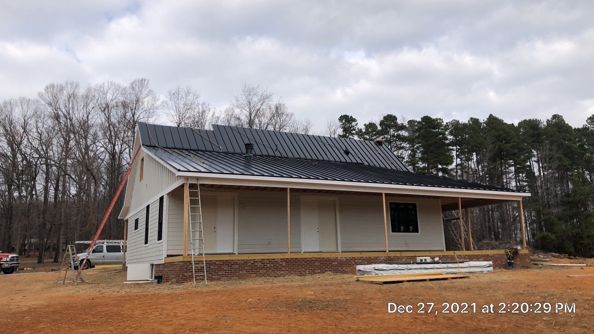 Custom Home Metal Roof Installation by Just In Time Roofing and Restoration