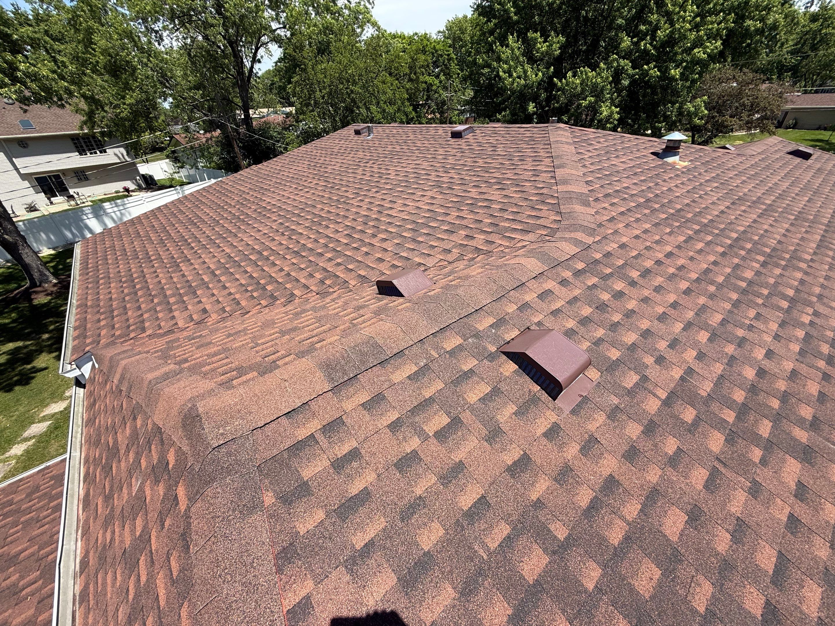 Roofing with GAF and gutters by Optimal Home Improvement 
