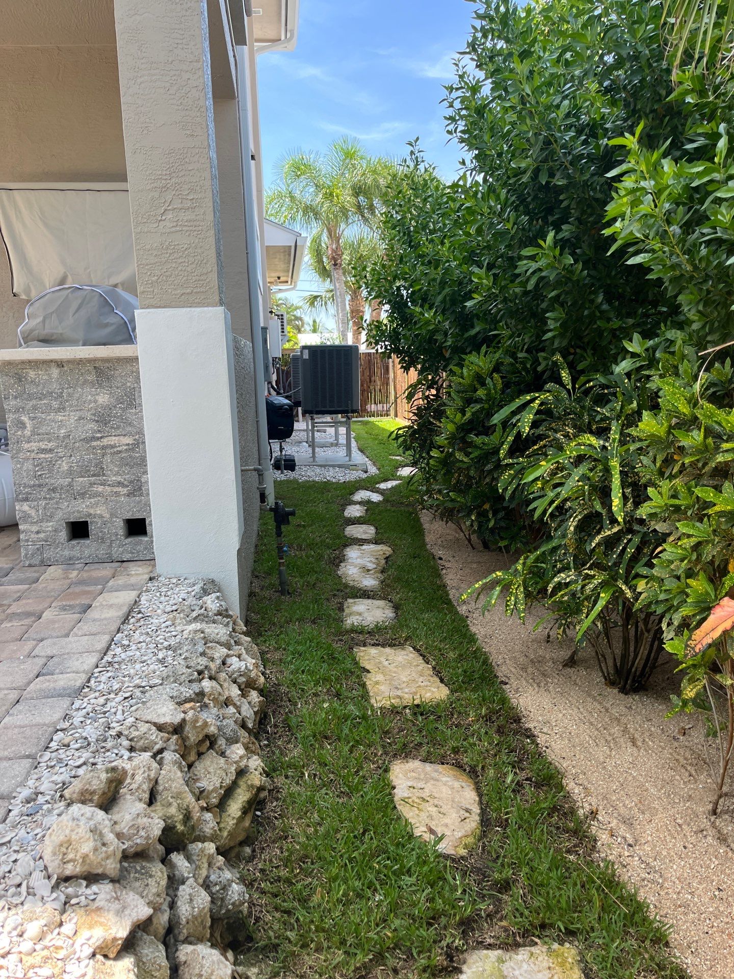 “Tropical Oasis Transformation in Palm City” by Alpha Zeta Enterprises Inc
