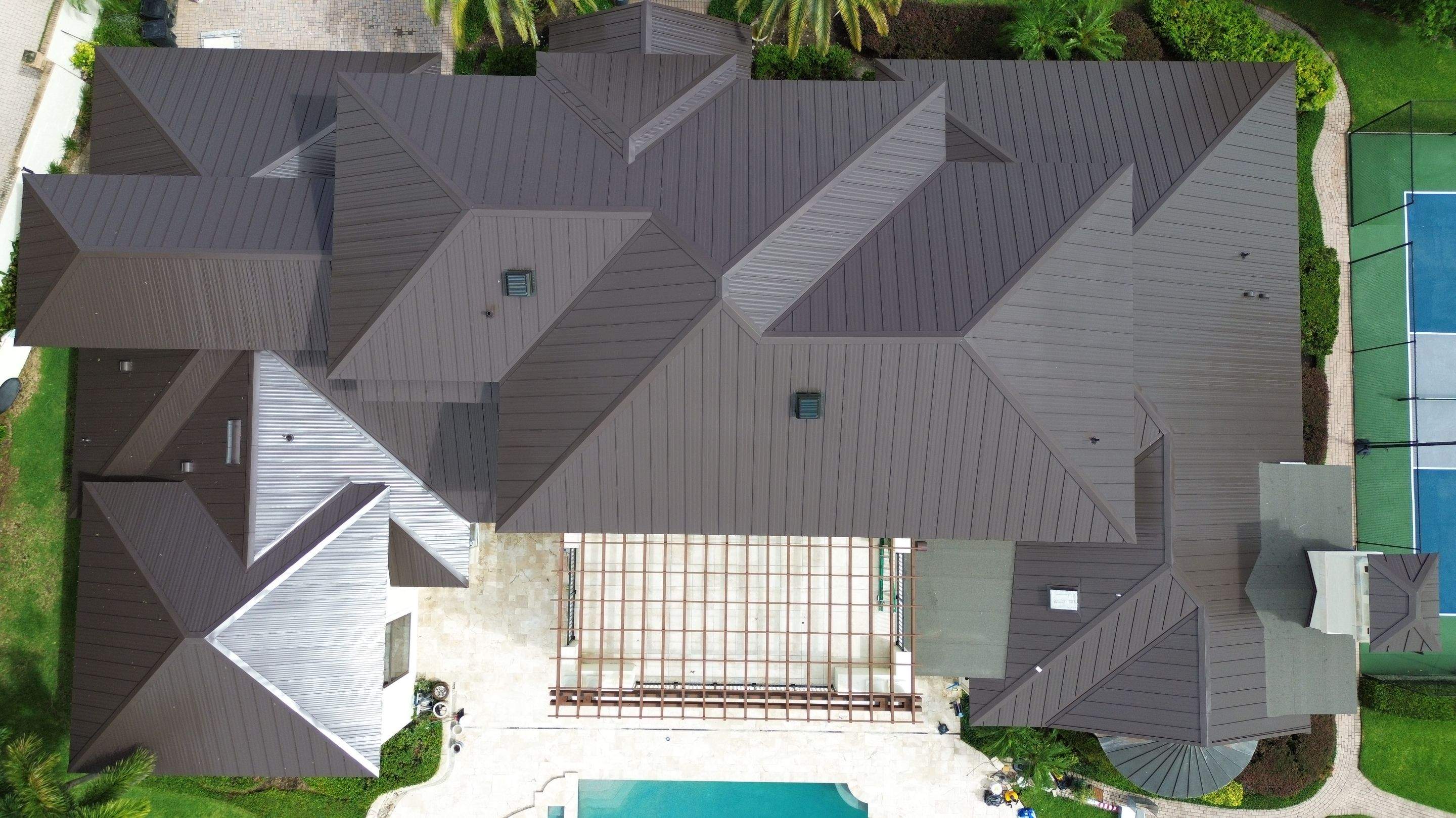 Standing seam metal roof on Lake Conway FL by Gold Key Roofing