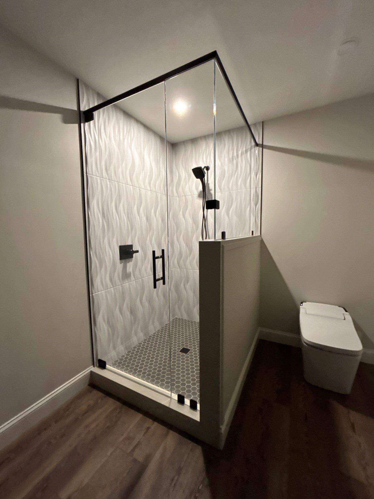 Frameless Shower Enclosure w/Header Bar by Cheshire Glass Company