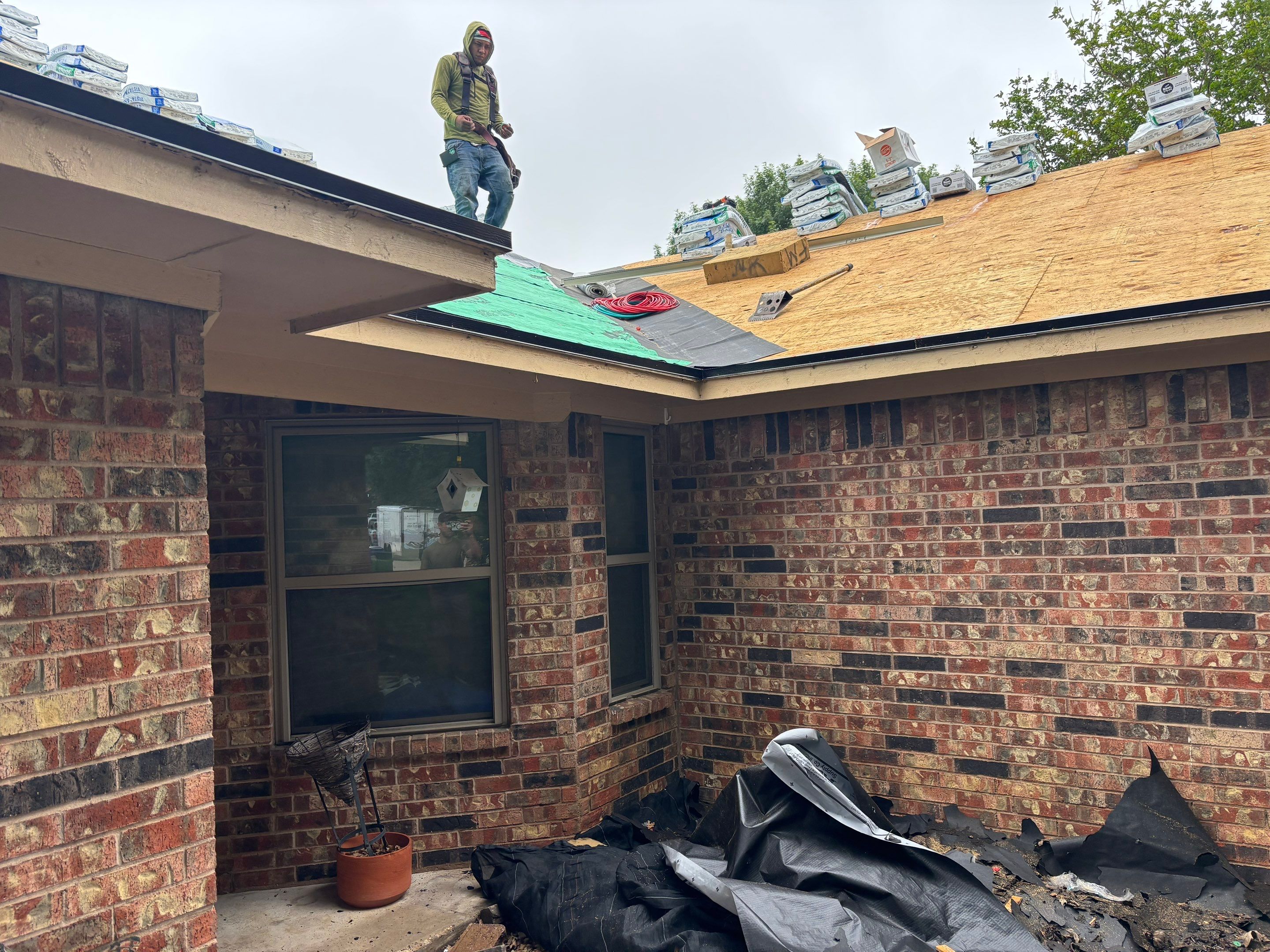 New Sky light/ New Roof/ Gutters and Fence Staining.  by Berry Good Roofing 