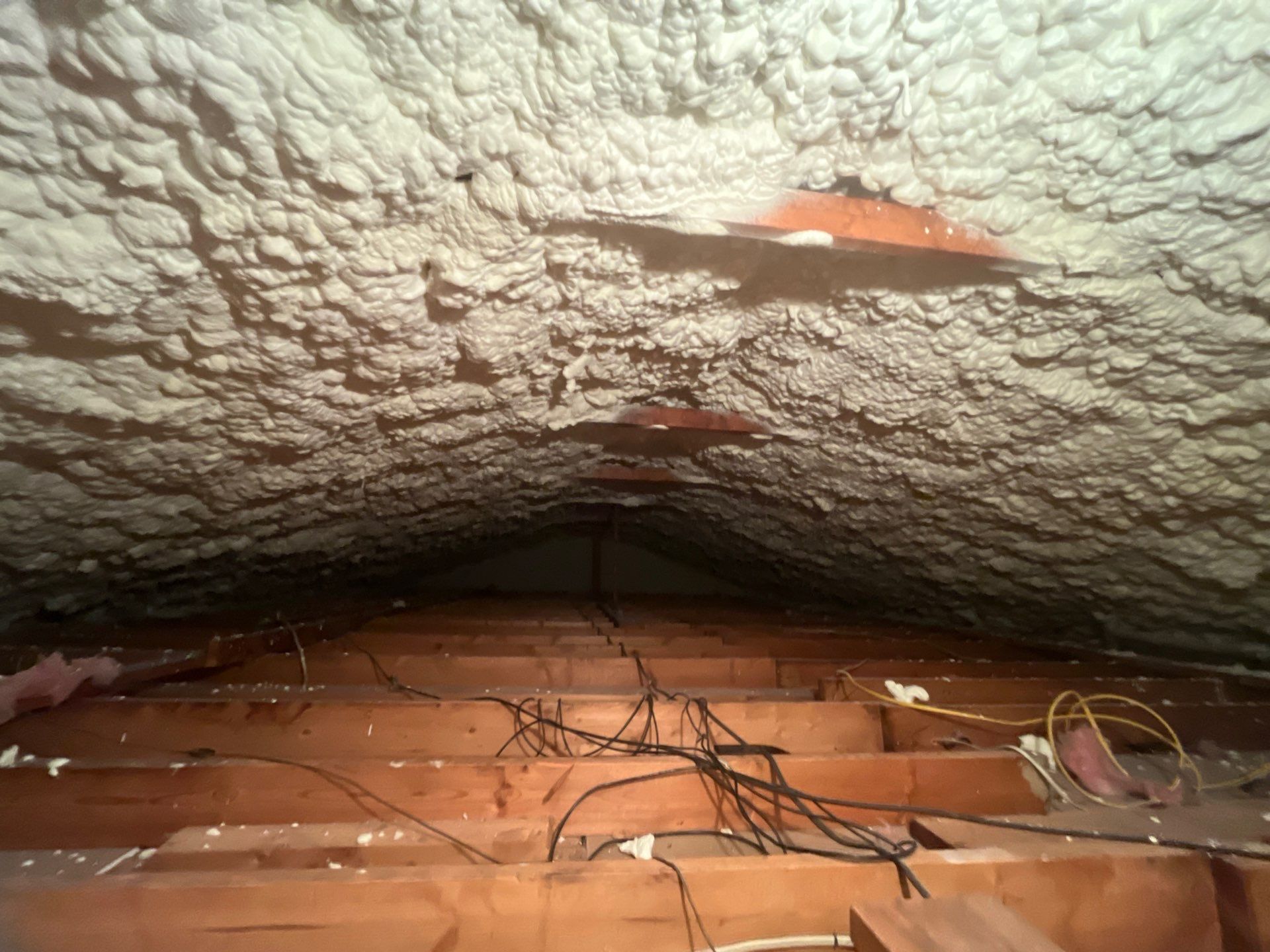 Garage ceiling using open cell spray foam by NYS Foam & Energy