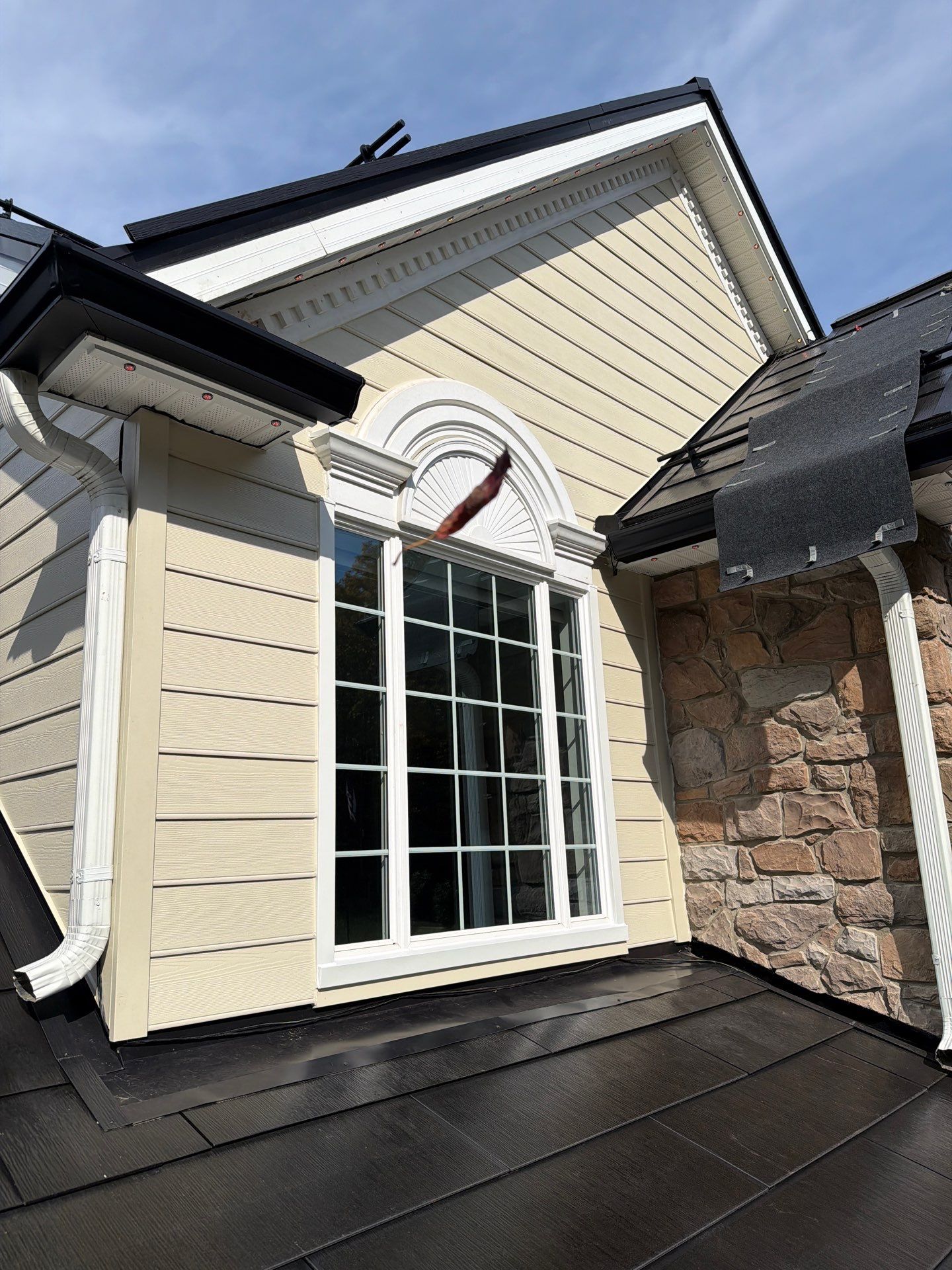 Beautiful James Hardie Siding & Tesla Solar Roof by American Home Contractors