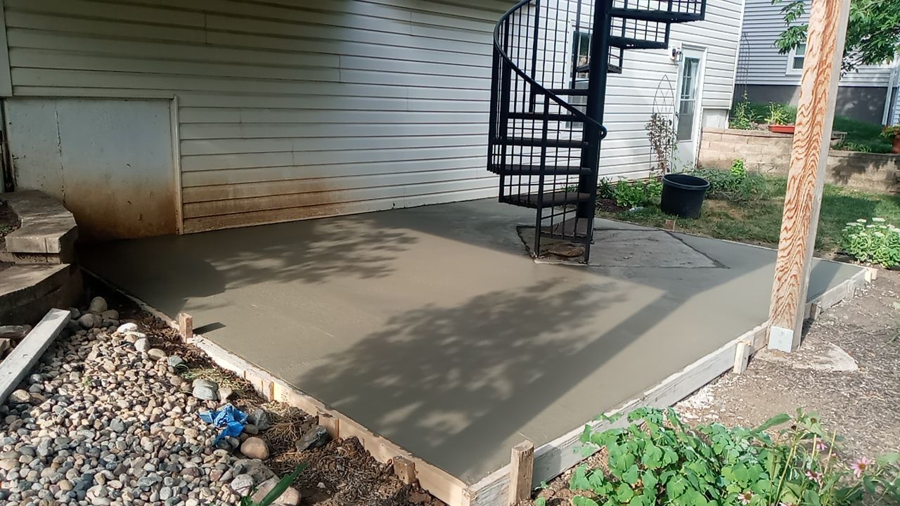 Back Yard Paver Patio by LAND ESCAPES LLC