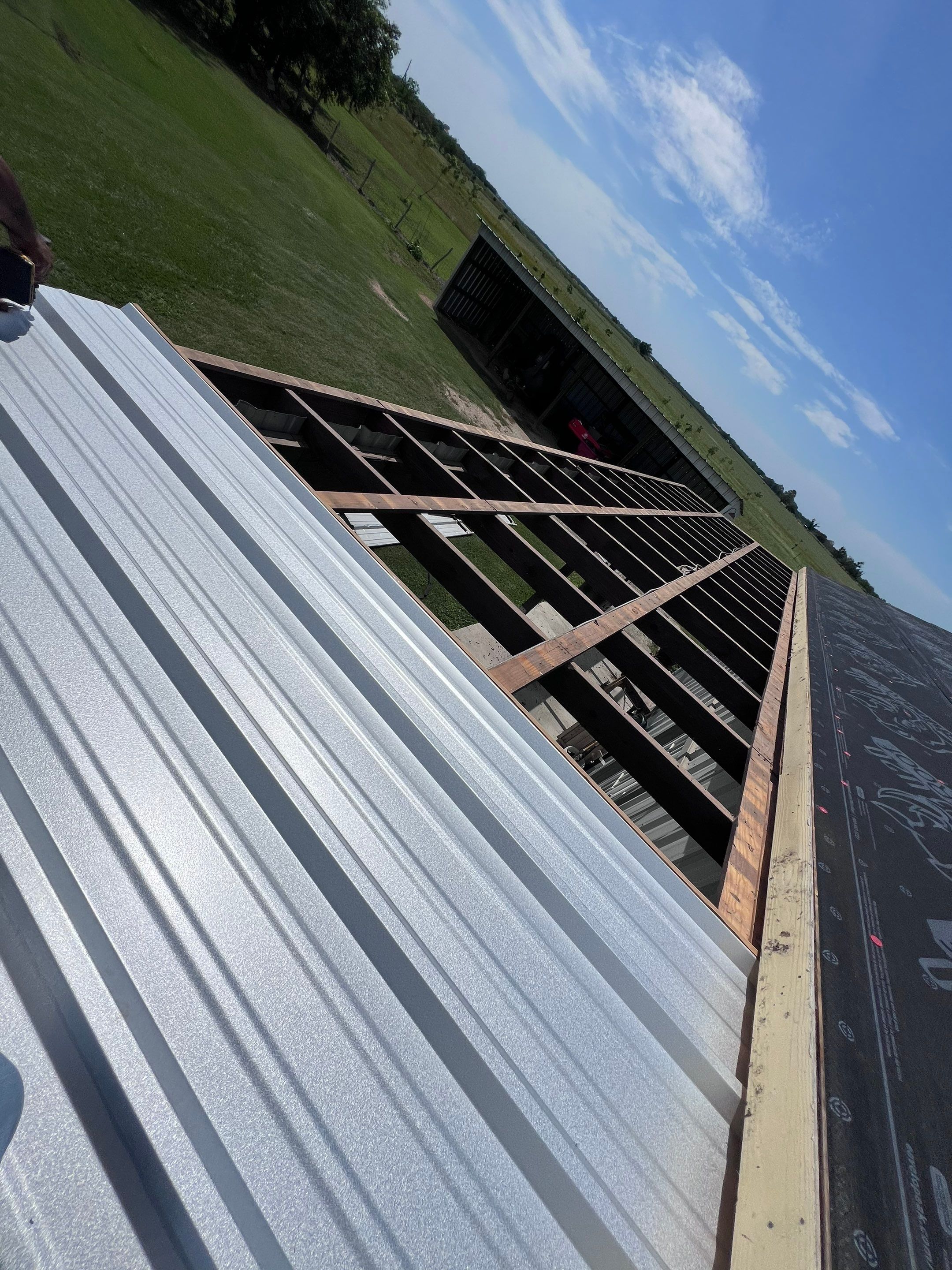 Residential Roofing Installation using Metal by Roof Repair Company