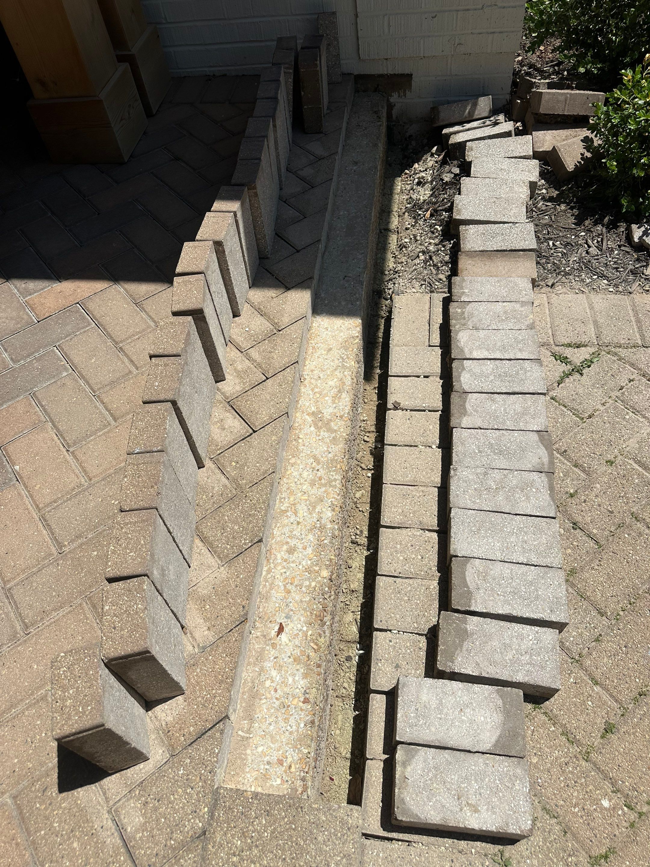 Brick paver repair, cleaning and sealing by Northern Power Washing LLC.