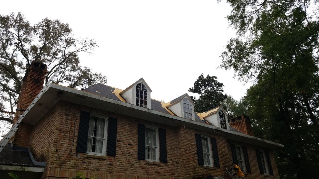 Residential Roofing Installation using Roof Replacement by American Roofing & Construction LLC