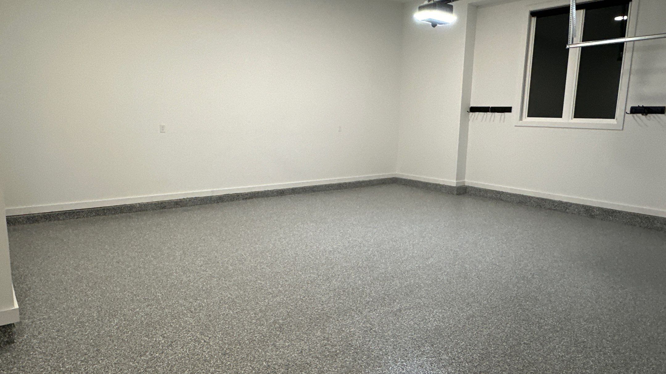 Michael K got his dream garage with a brand new floor by Banner Garage