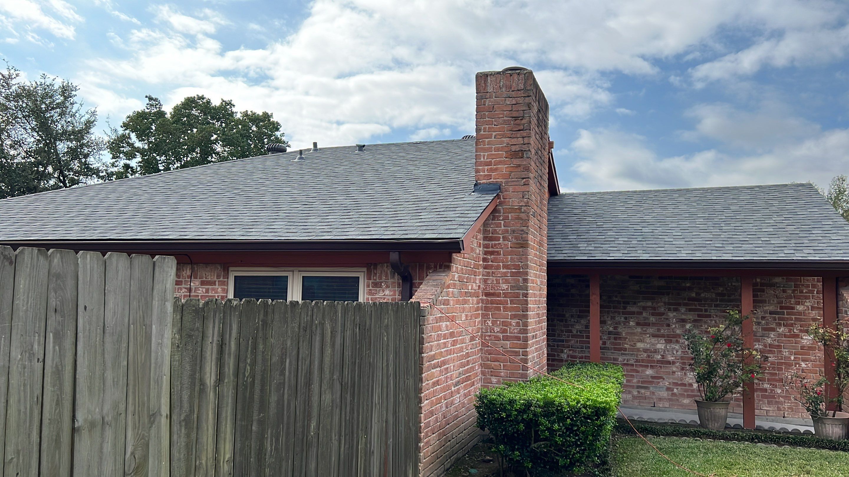 New Gray Shingle Roof on Brick Home — Houston, TX by PL Roofing & SB Roofing, LLC.