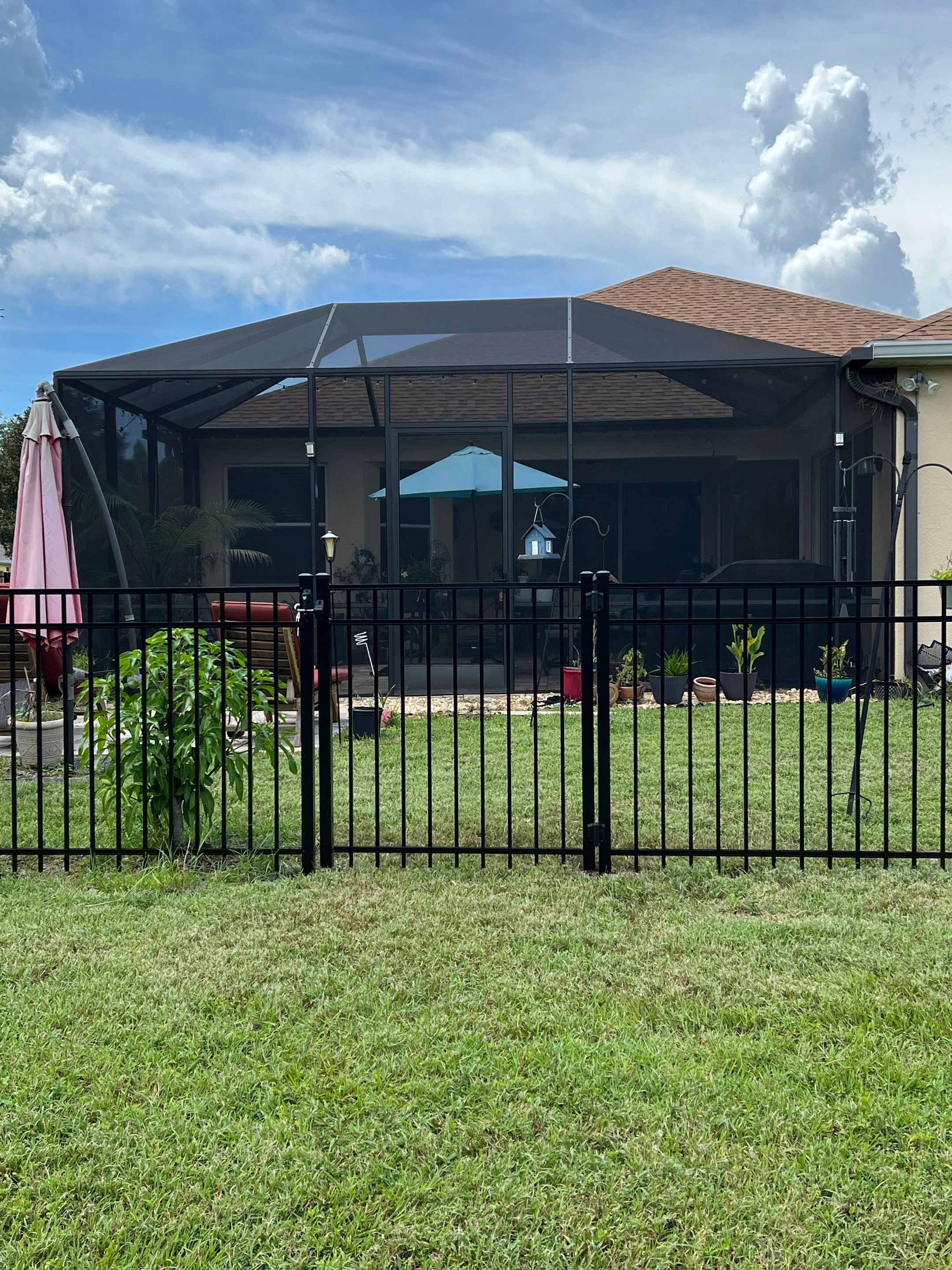 Black Aluminum Fence Installation in Bradenton, FL by Asap fence and gates, LLC
