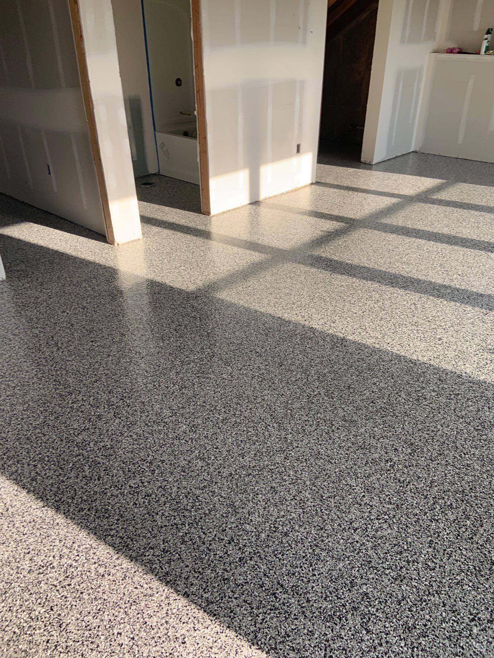 Basement Transformation using Domino by Croc Coatings, LLC