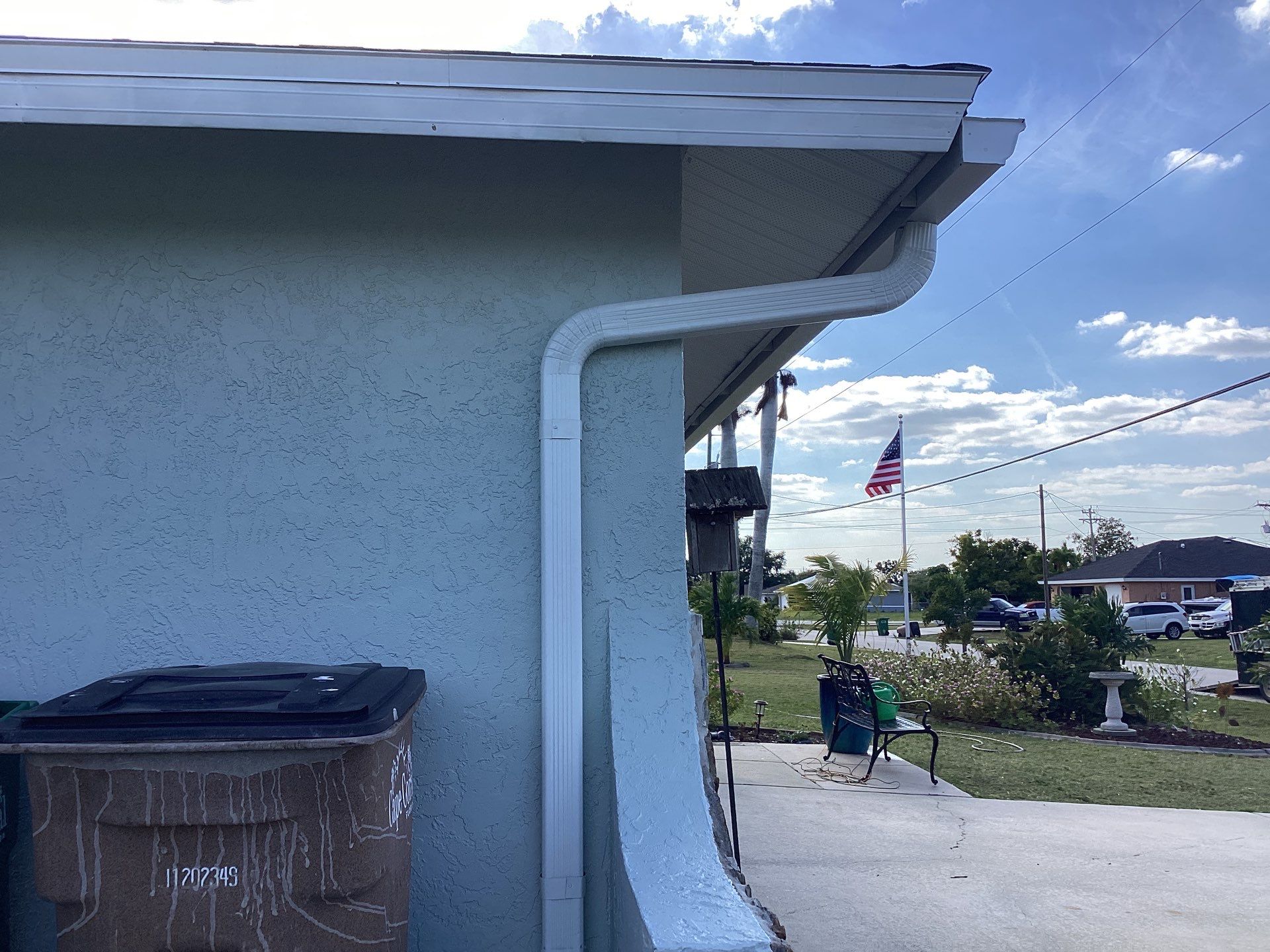 Downspout Installation using 3X4 Elbow Downspout in Cape Coral FL by Gutter Professors