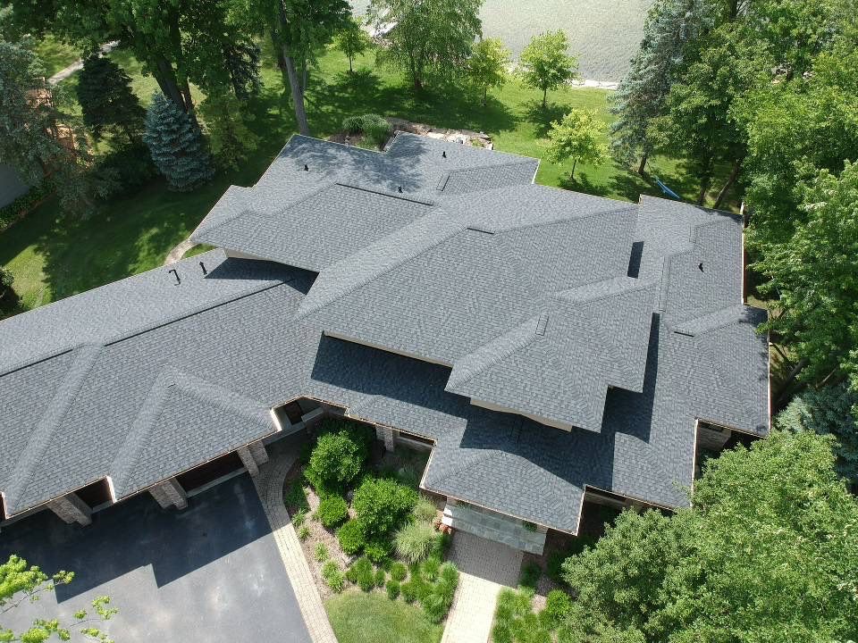 Large Lakeside Roof Replacement by Bloomfield Construction & Restoration