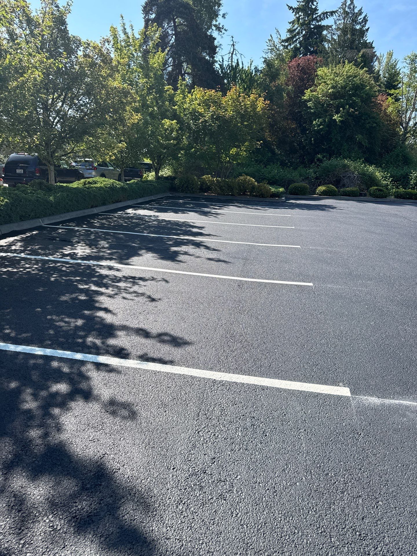 King Machine Business Parking Lot Sealcoat Overlay | Mukilteo by Jireh Asphalt & Concrete Inc 