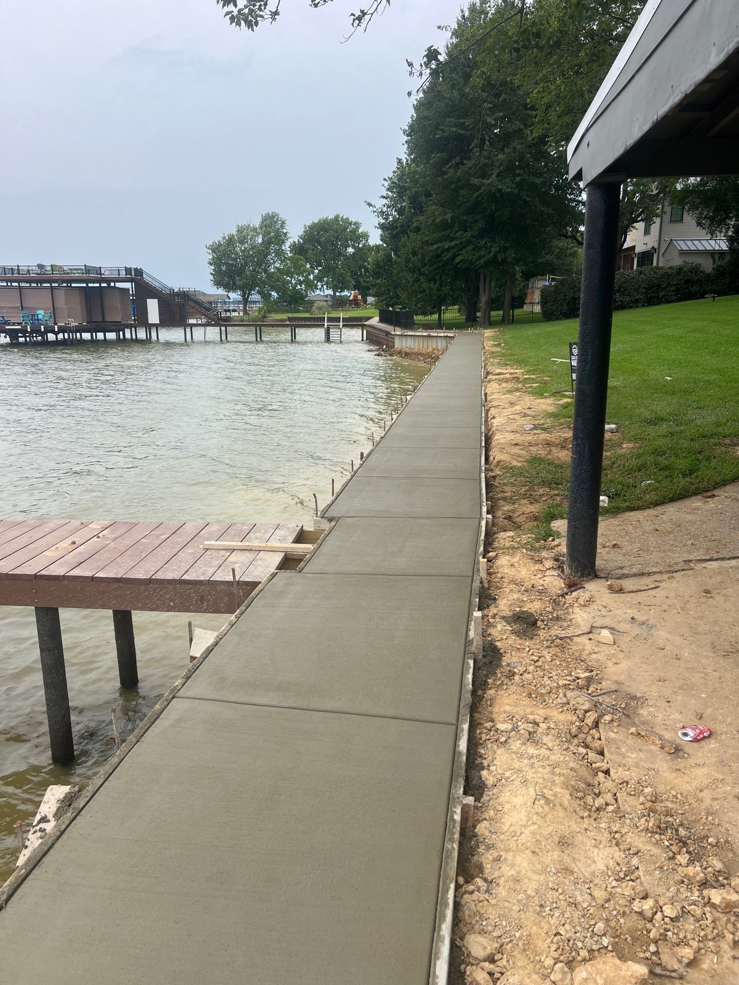 Retaining Cap Sidewalk at Cedar Creek Lake in Gun Barrel City by Rodriguez Concrete Construction