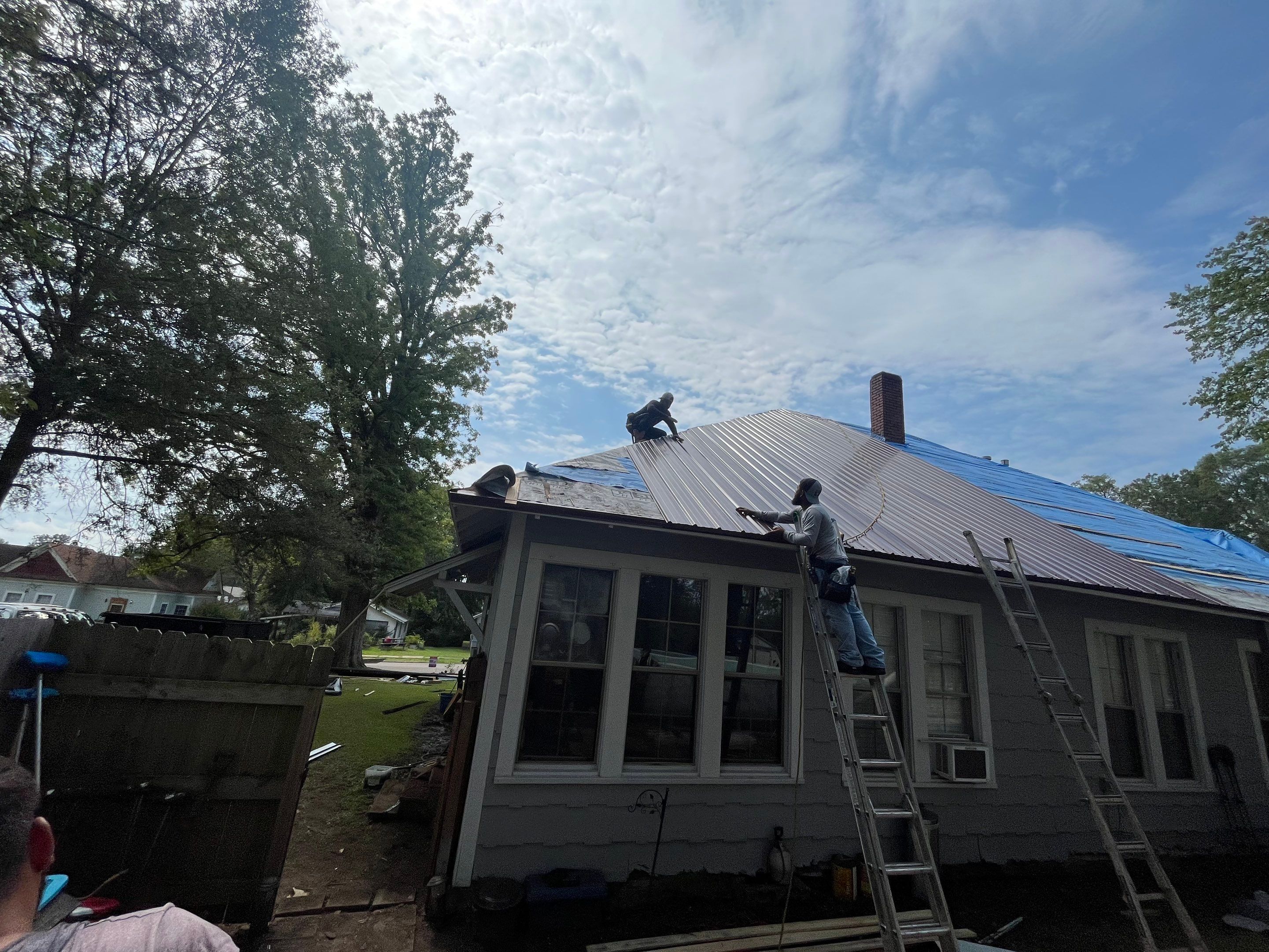 Residential Metal Roof Replacement using Reed's Metals: Colored Residental Panel (Burgundy) by Hostetler Roofing