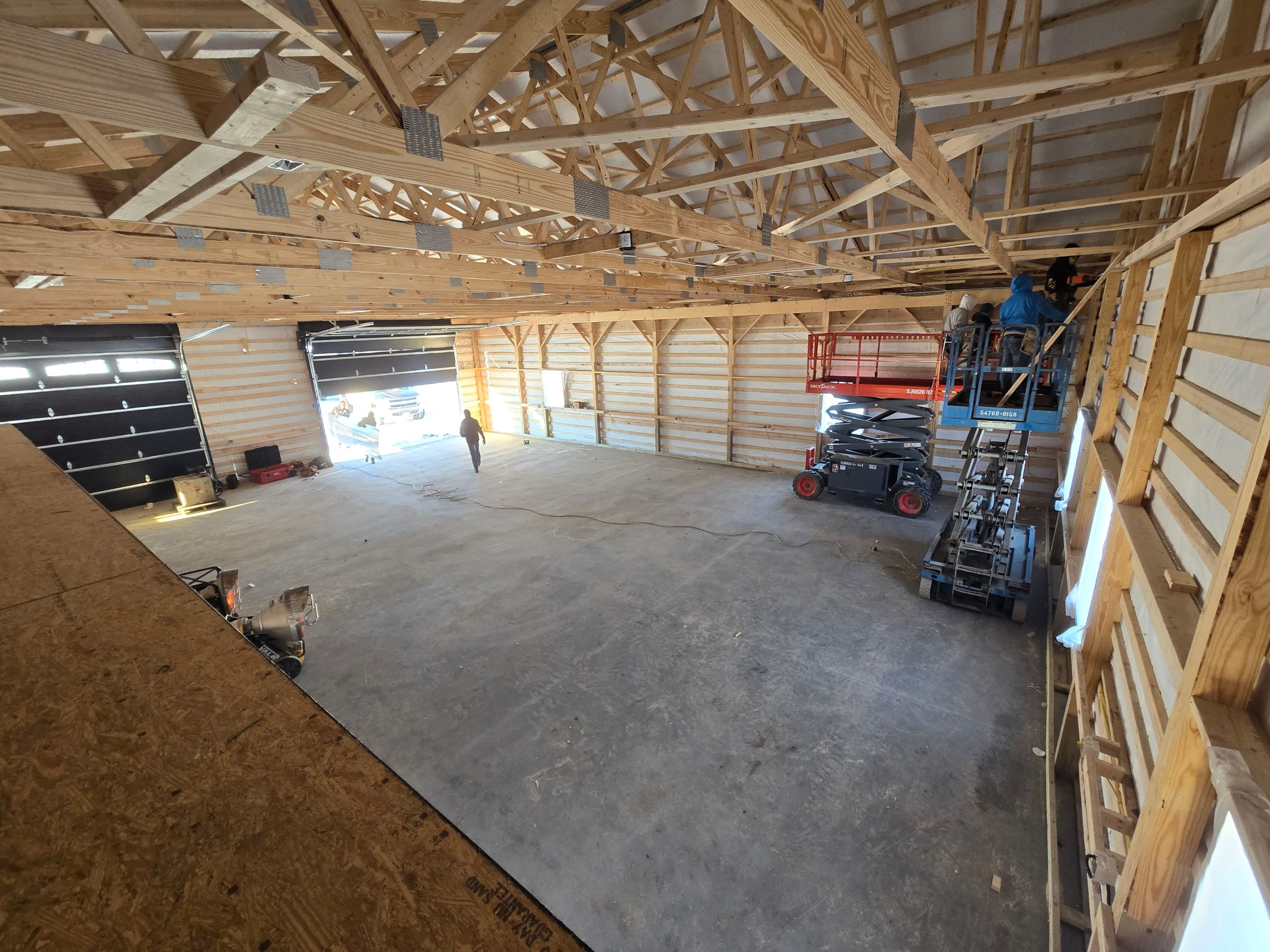 Barndominium  using Textured Board & Batton by Horst Custom Homes 