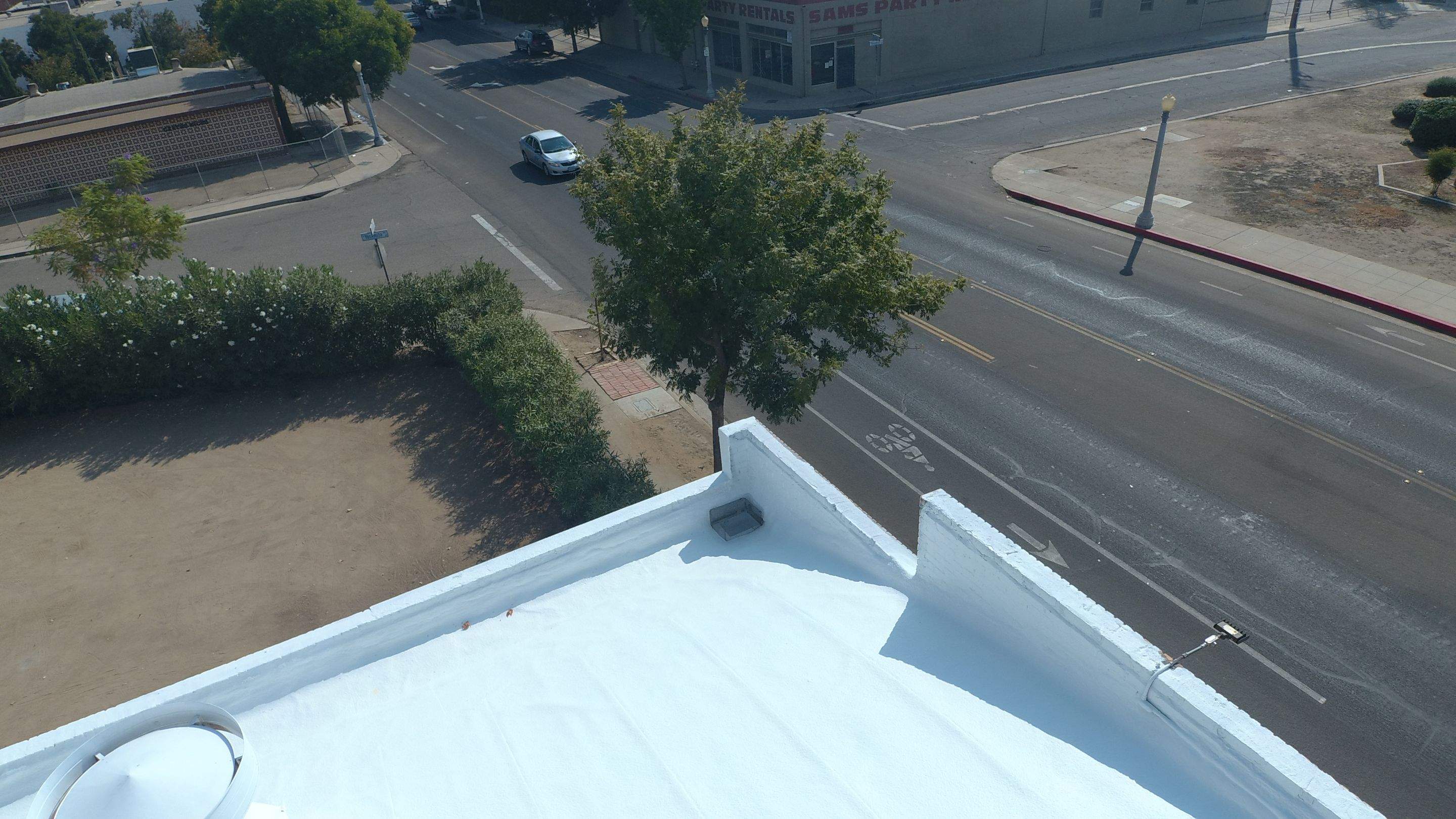 Polyurethane foam roof refurbish and recoating by Straight Edge Roofing Inc