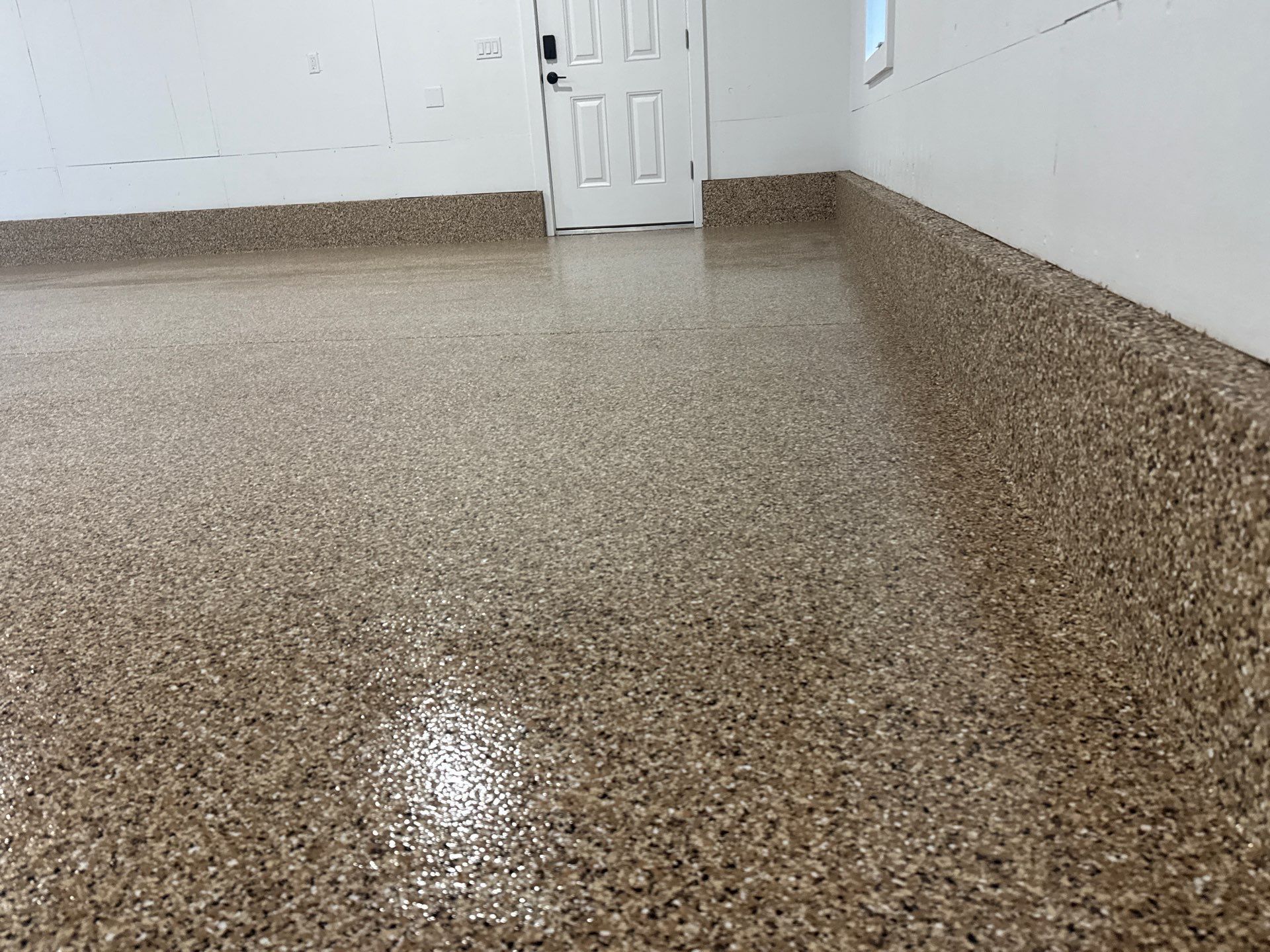 Garage in Gainesville, FL in Sandstone by Cross Creek Concrete Coatings