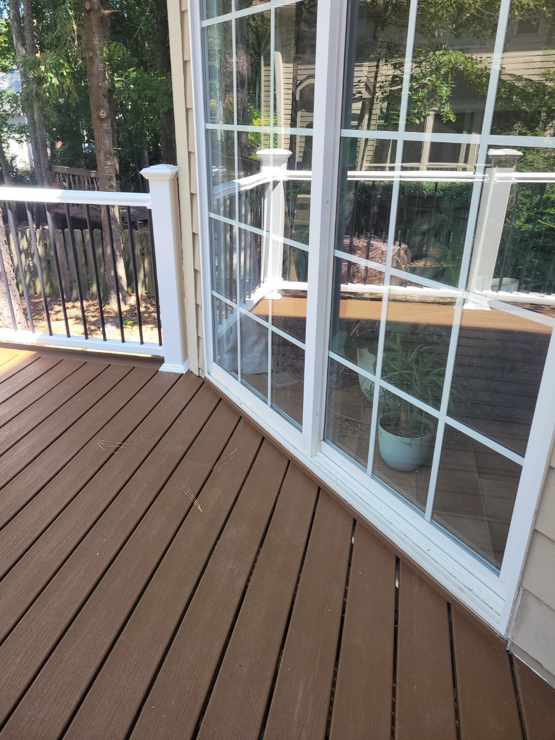 Fuquay-Varina Outdoor Upgrade – Composite Deck & Paved Landing by Elite Remodeling and Design LLC