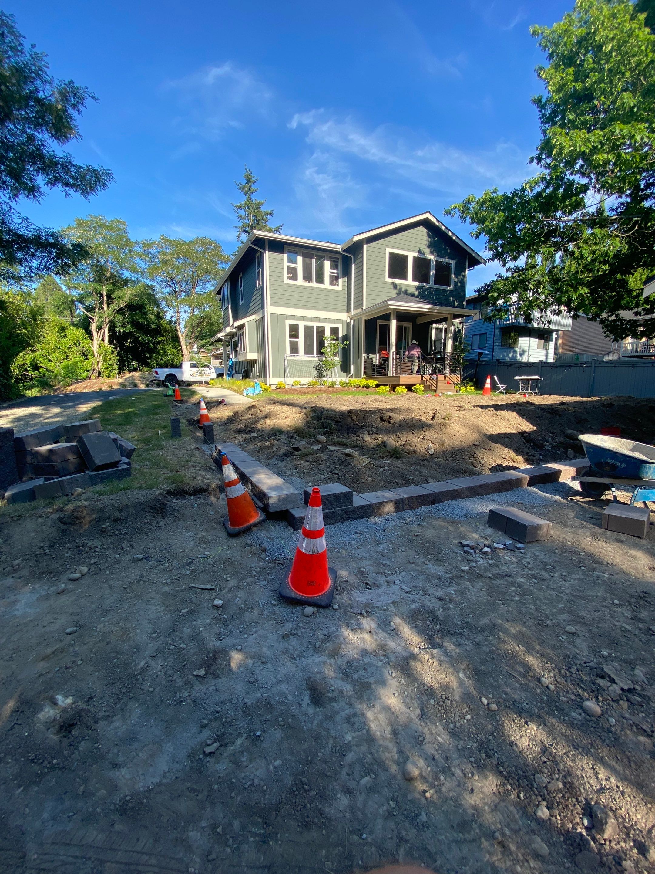 Patio Installation using Concrete, Retaining walls, and Turf install by Jireh Asphalt & Concrete Inc 