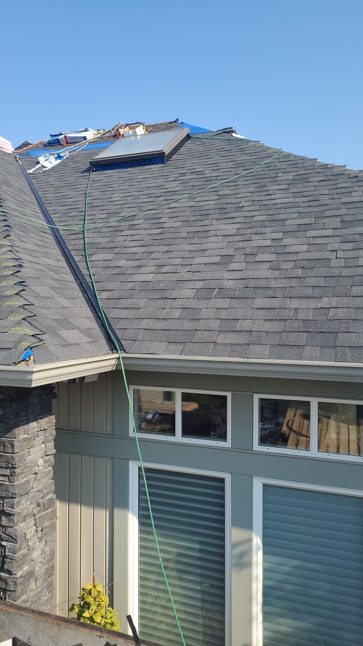 Residential Roofing Installation using Malarky Vista Shingles by Top Notch Roofing Inc