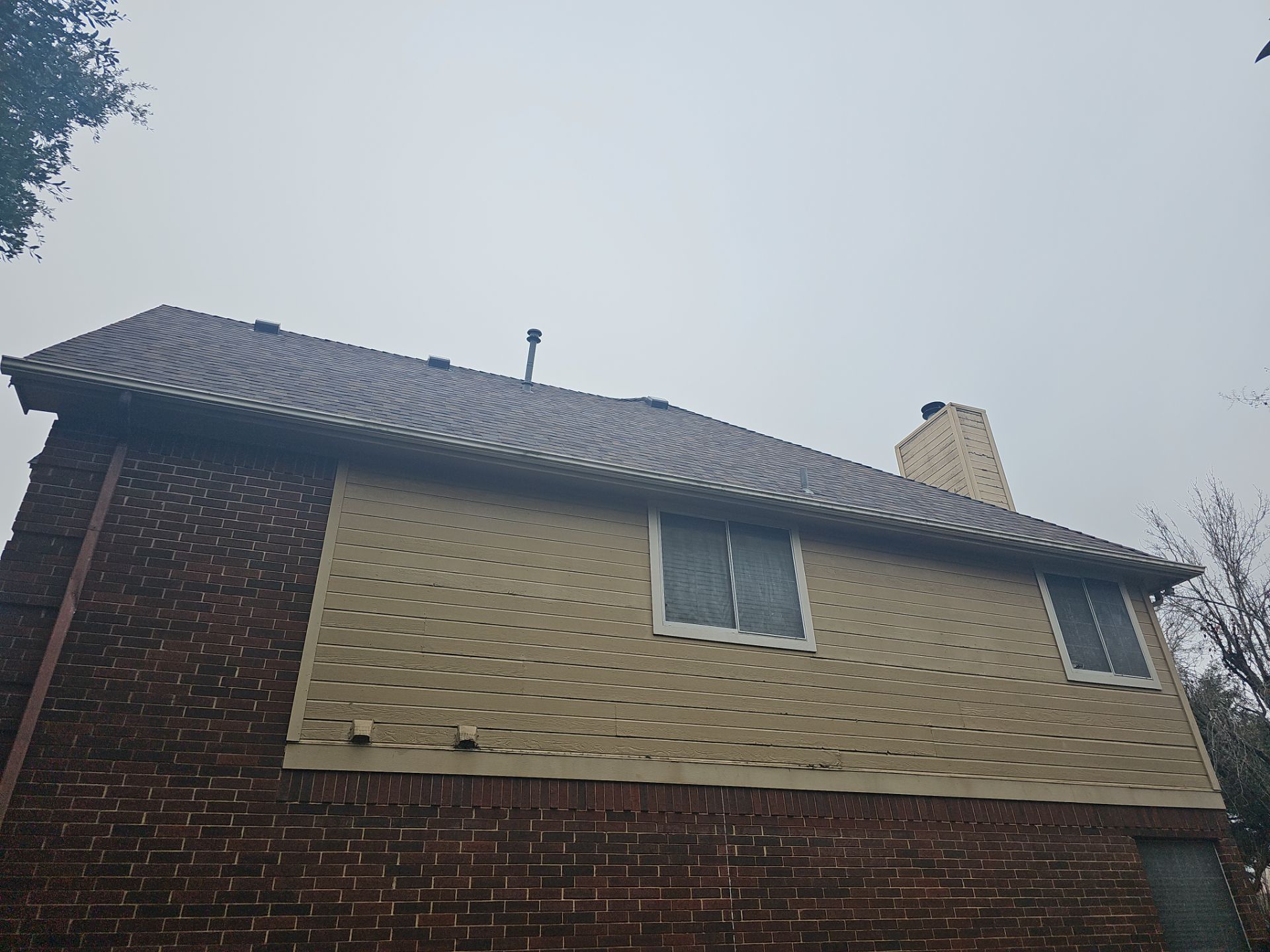 New Hardie Lap Siding & Board and Batten by DeZign Roofing & Exteriors