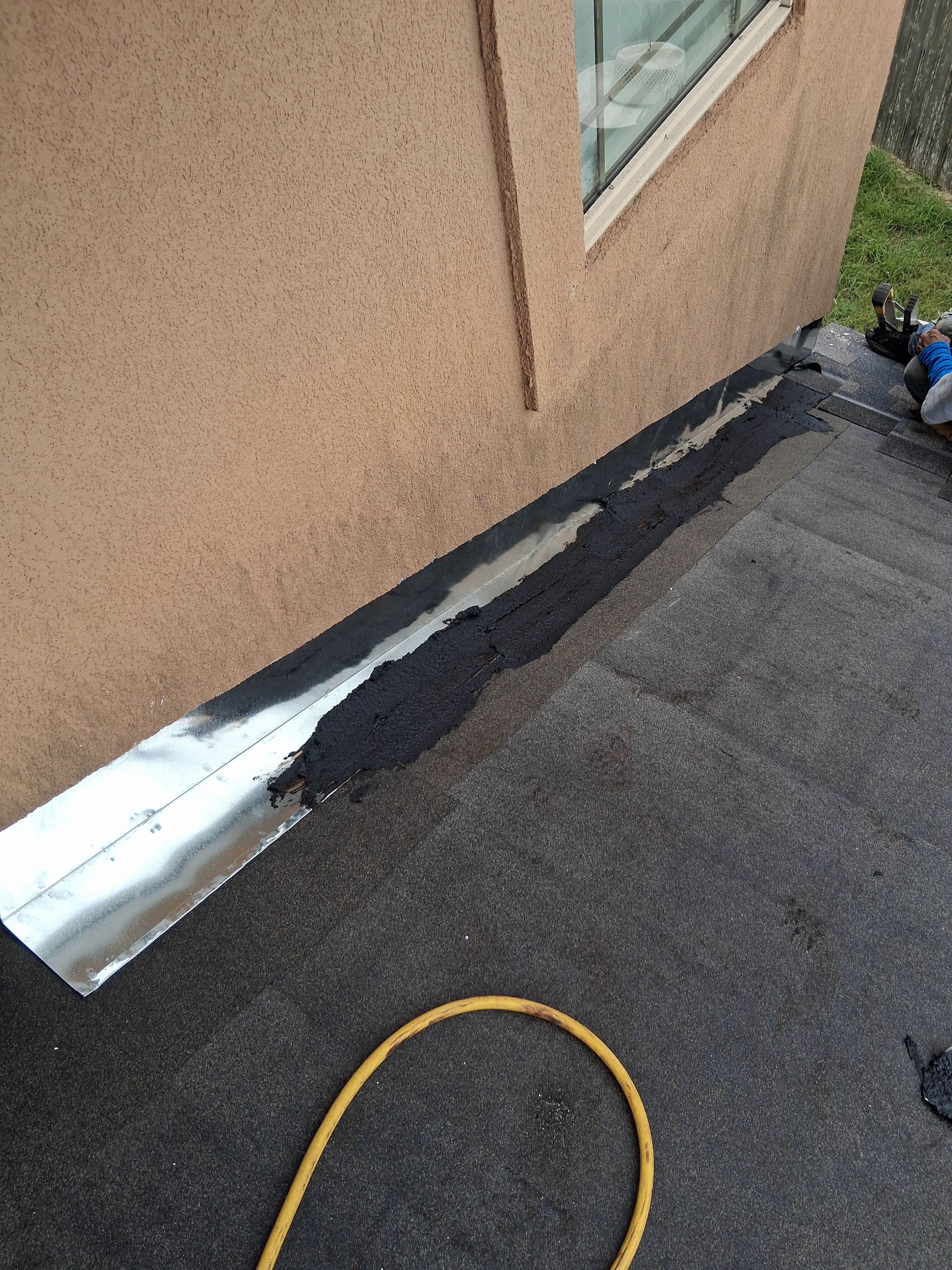 Flashing Stucco above the Roof by Bayfront Roofing and Construction