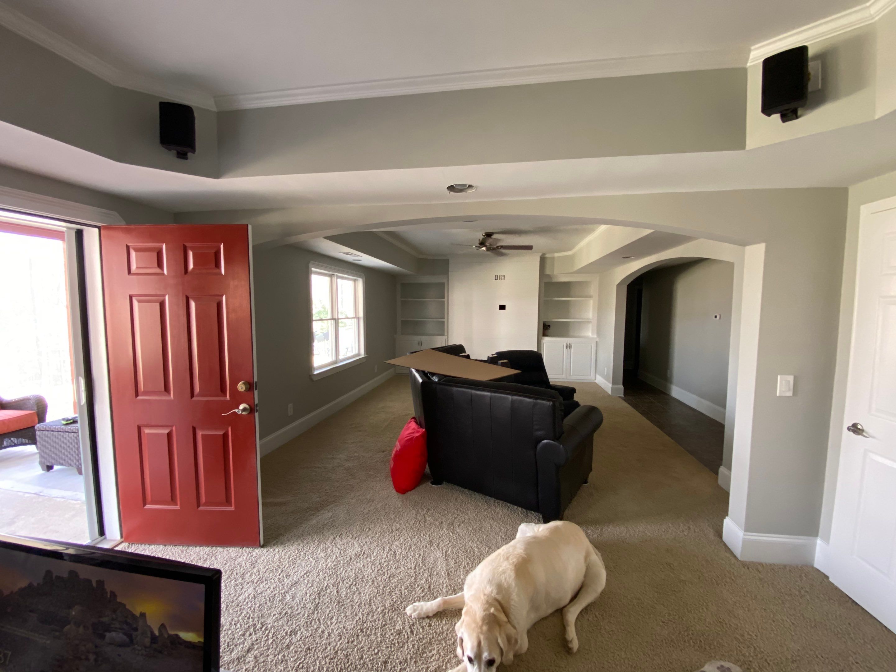 Finished Basement Renovation with Custom Shiplap and Modernized Wood Railings by Swift Home Renovations 