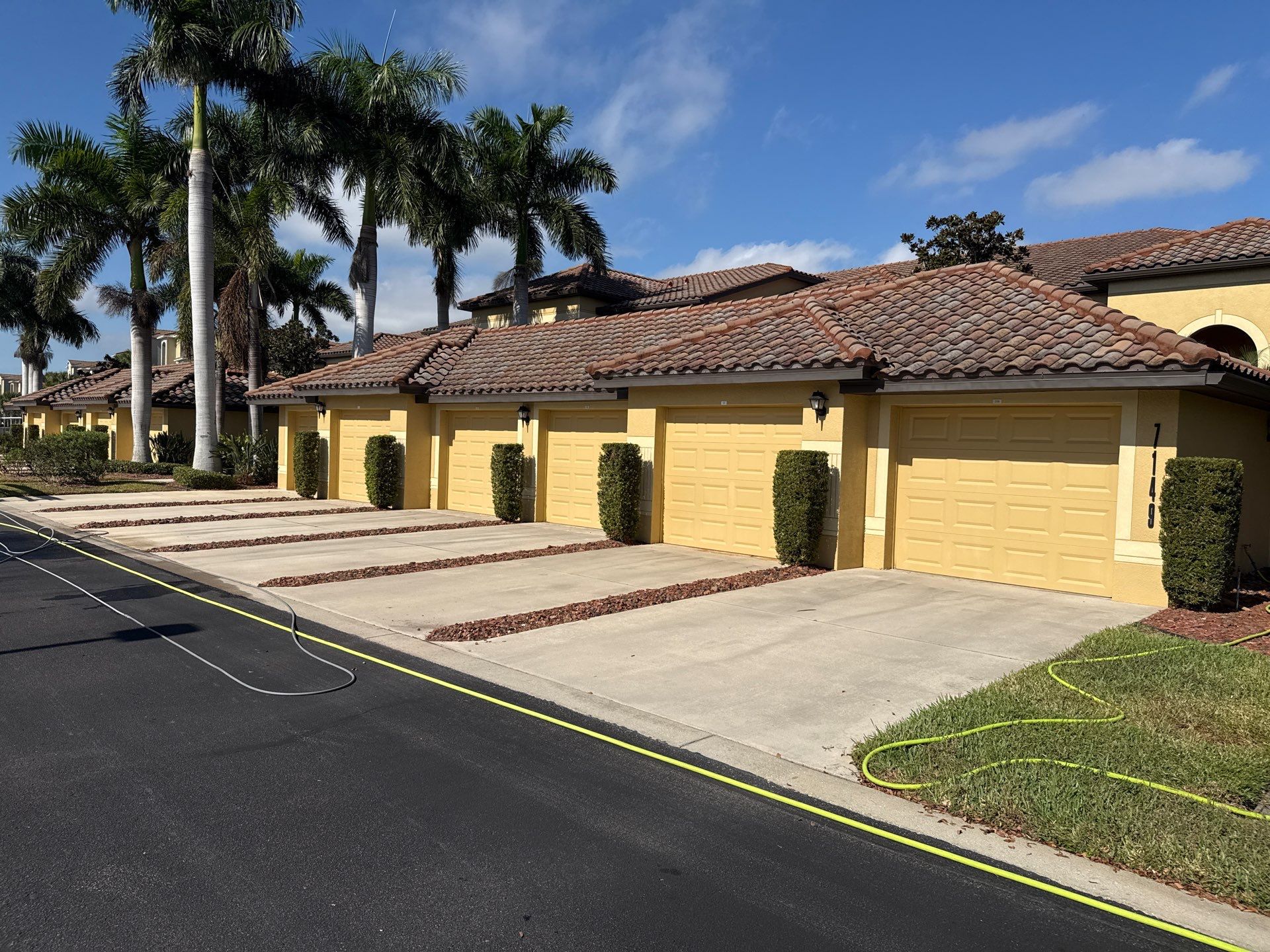 HOA Condo Concrete Driveway & Sidewalk Cleaning – River Strand Community, Bradenton, FL by Sunshine AquaWash