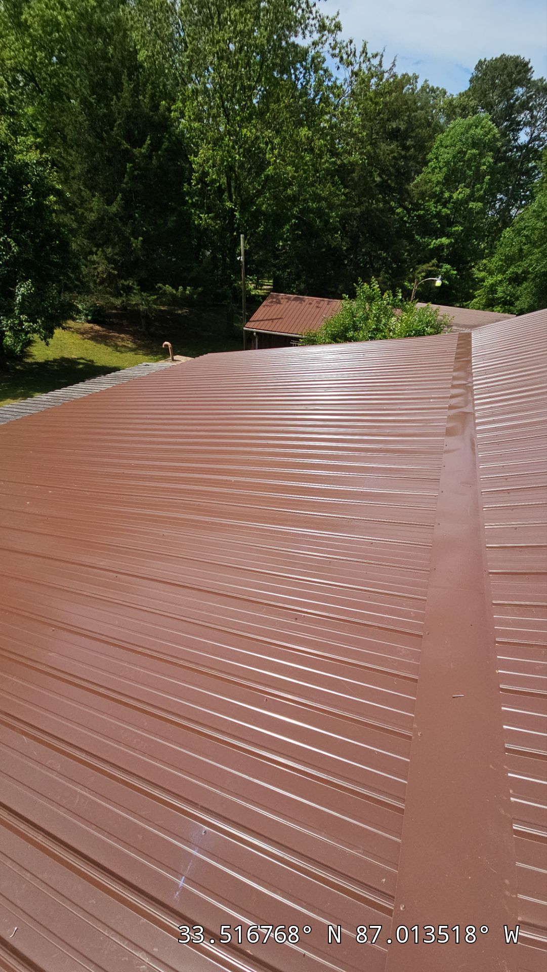 Metal Roof Replacement in Sylvan Springs (Brown) by The Roofing Dudes