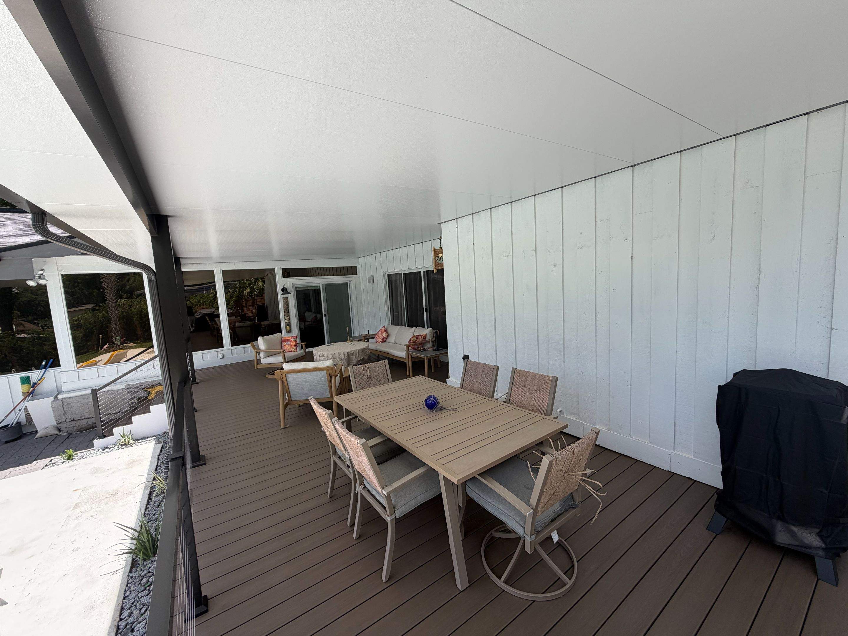 Aluminun patio cover using Deckorators venture by Orlando pergolas