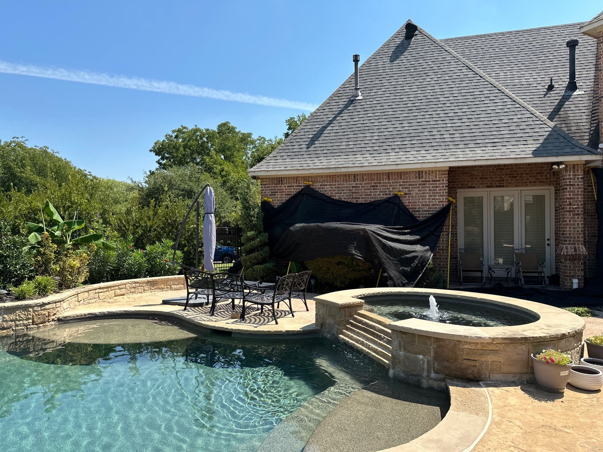 Southlake Texas Estate - Roof, Copper Awning and Gutter Project by First United Roofing & Construction