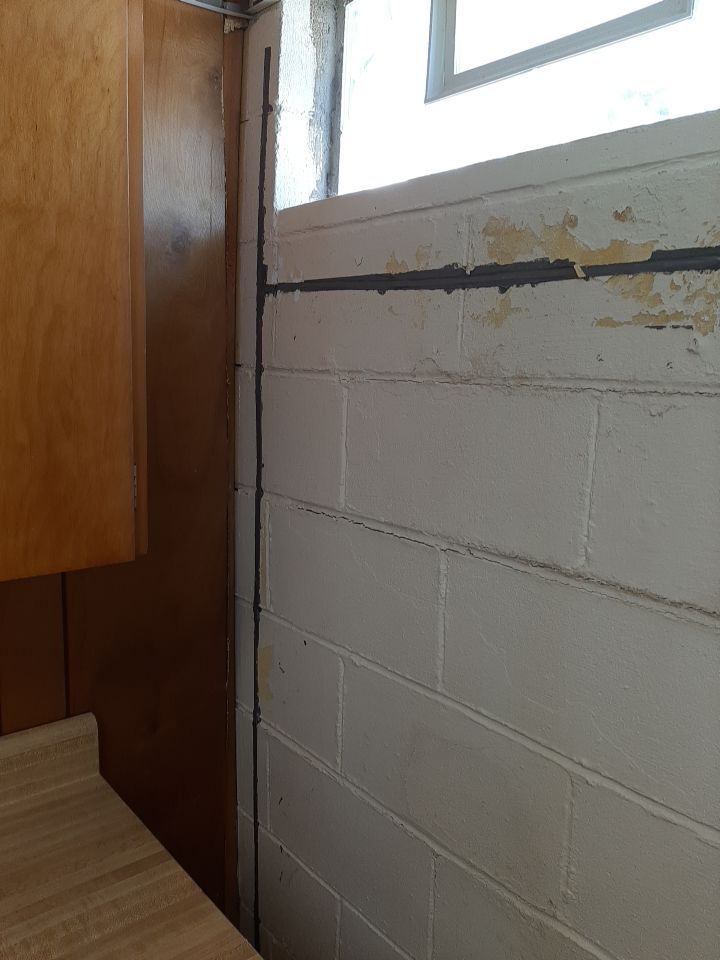 Wall Straightening and Reinforcement using Embedded Fiber Reinforcement by Toledo Basement Repair 