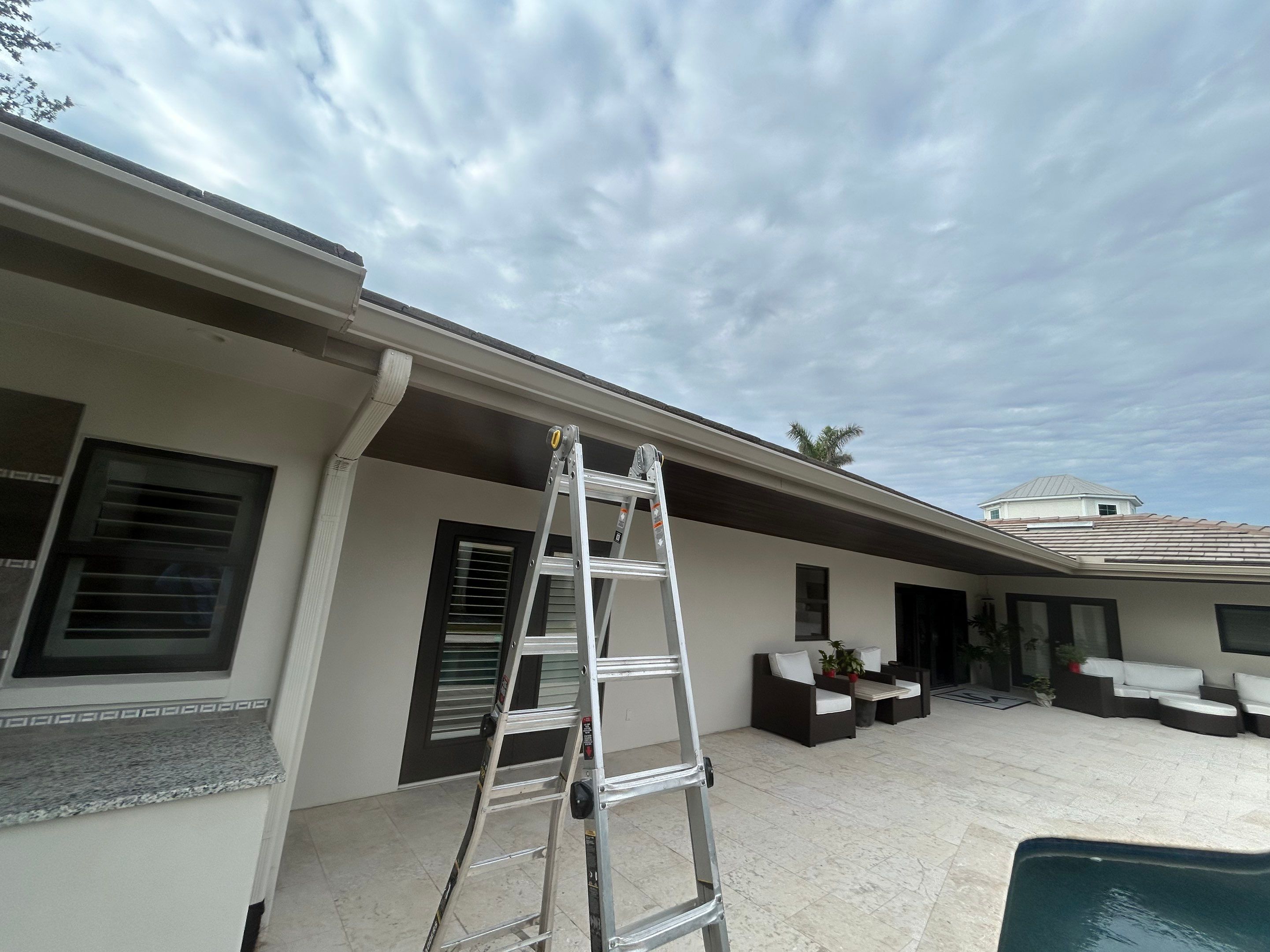 6-Inch White Seamless Gutters in Sarasota FL by Gutter Professors
