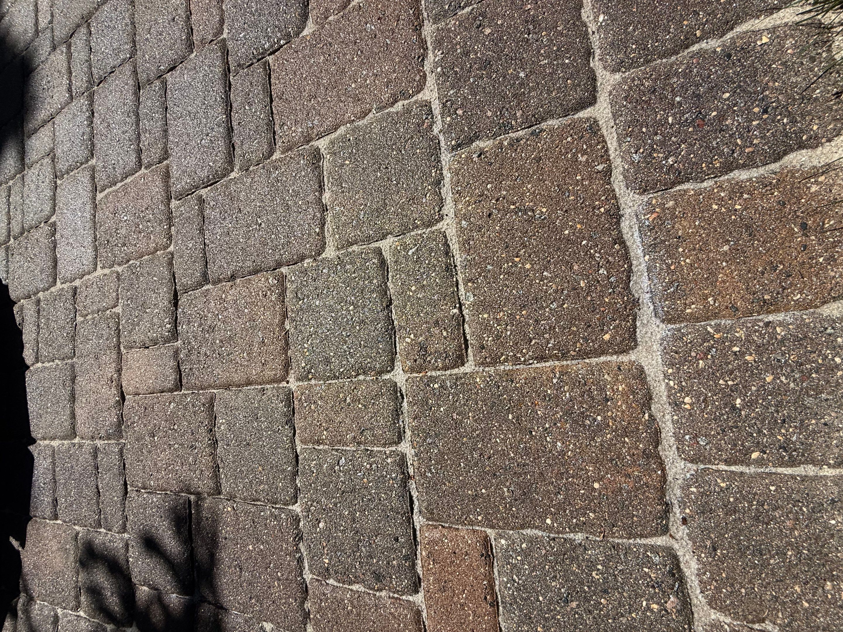Textured Concrete Coating and Paver Patio Refresh in Sioux Falls by Select Painting, Coatings & Garage Cabinets