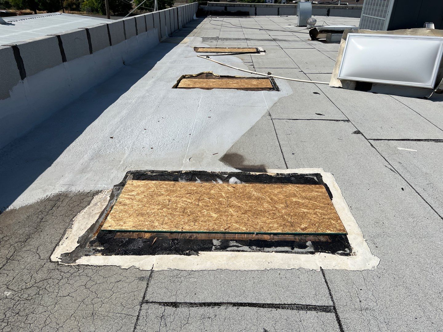 Spray foam and coatings using Conklin Benchmark/PUMA XL coatings and spray foam by Straight Edge Roofing Inc